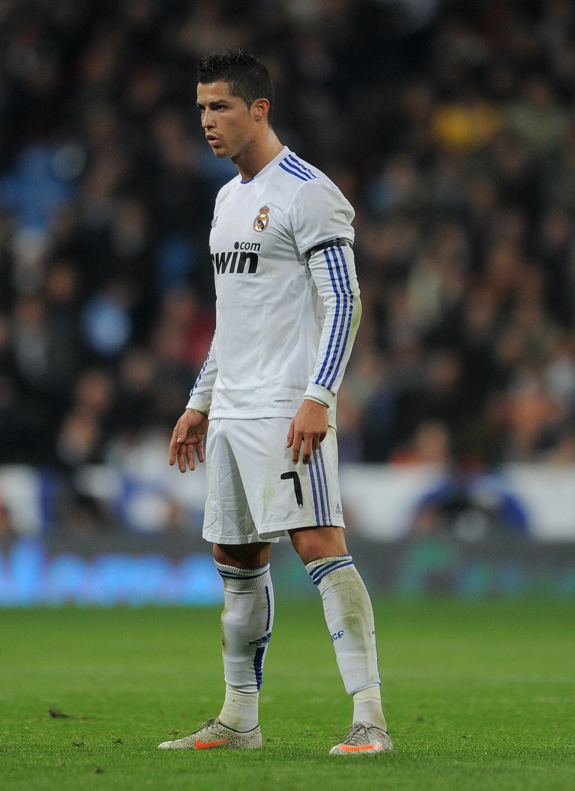 MADRID, SPAIN - JANUARY 13:  Cristiano Ronaldo of Real Madrid lines up a free kick during the quarter-final Copa del Rey first leg match between Real Madrid and Atletico Madrid at Estadio Santiago Bernabeu on January 13, 2011 in Madrid, Spain.  (Photo by 
