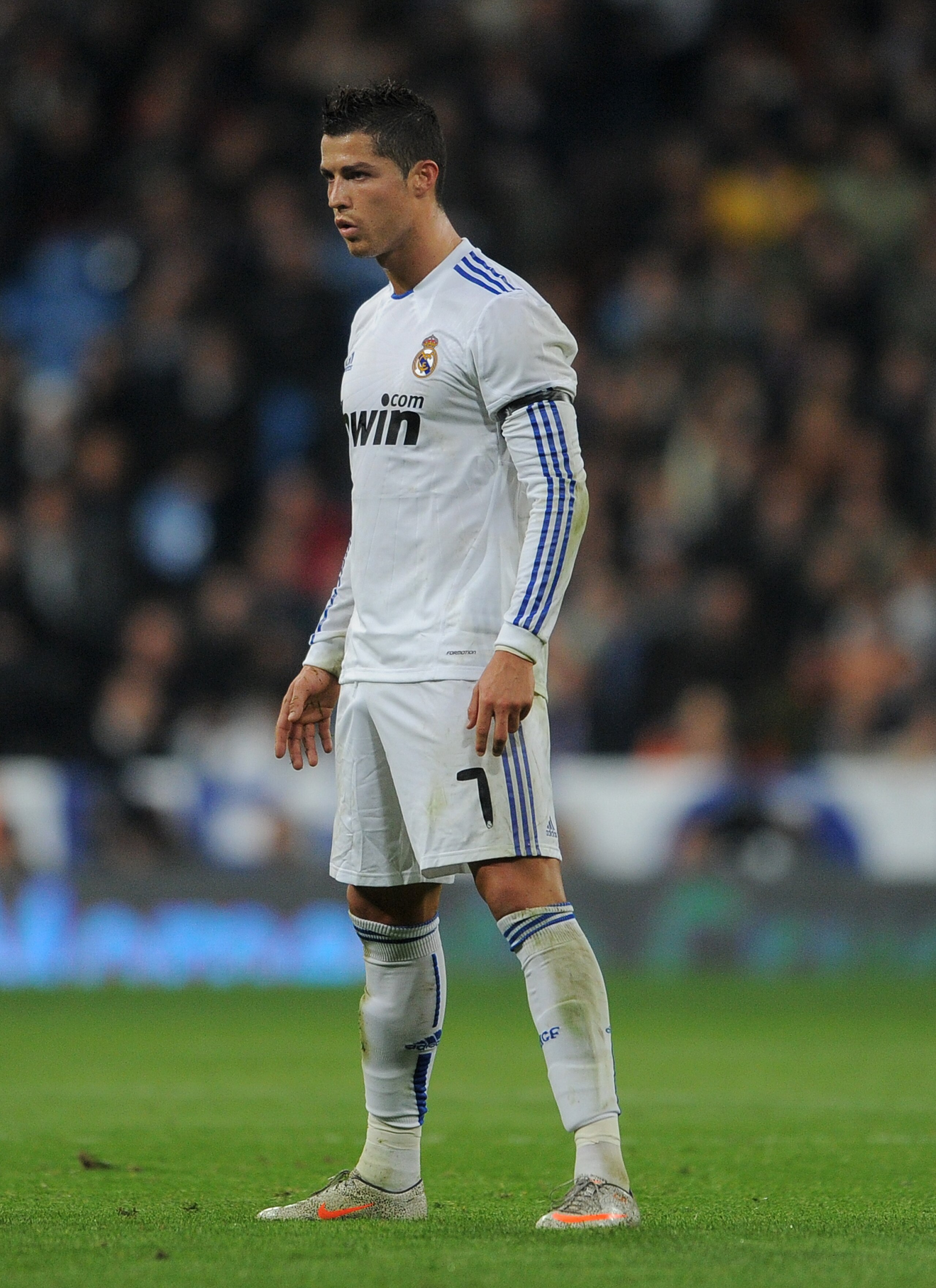 MADRID, SPAIN - JANUARY 13:  Cristiano Ronaldo of Real Madrid lines up a free kick during the quarter-final Copa del Rey first leg match between Real Madrid and Atletico Madrid at Estadio Santiago Bernabeu on January 13, 2011 in Madrid, Spain.  (Photo by 