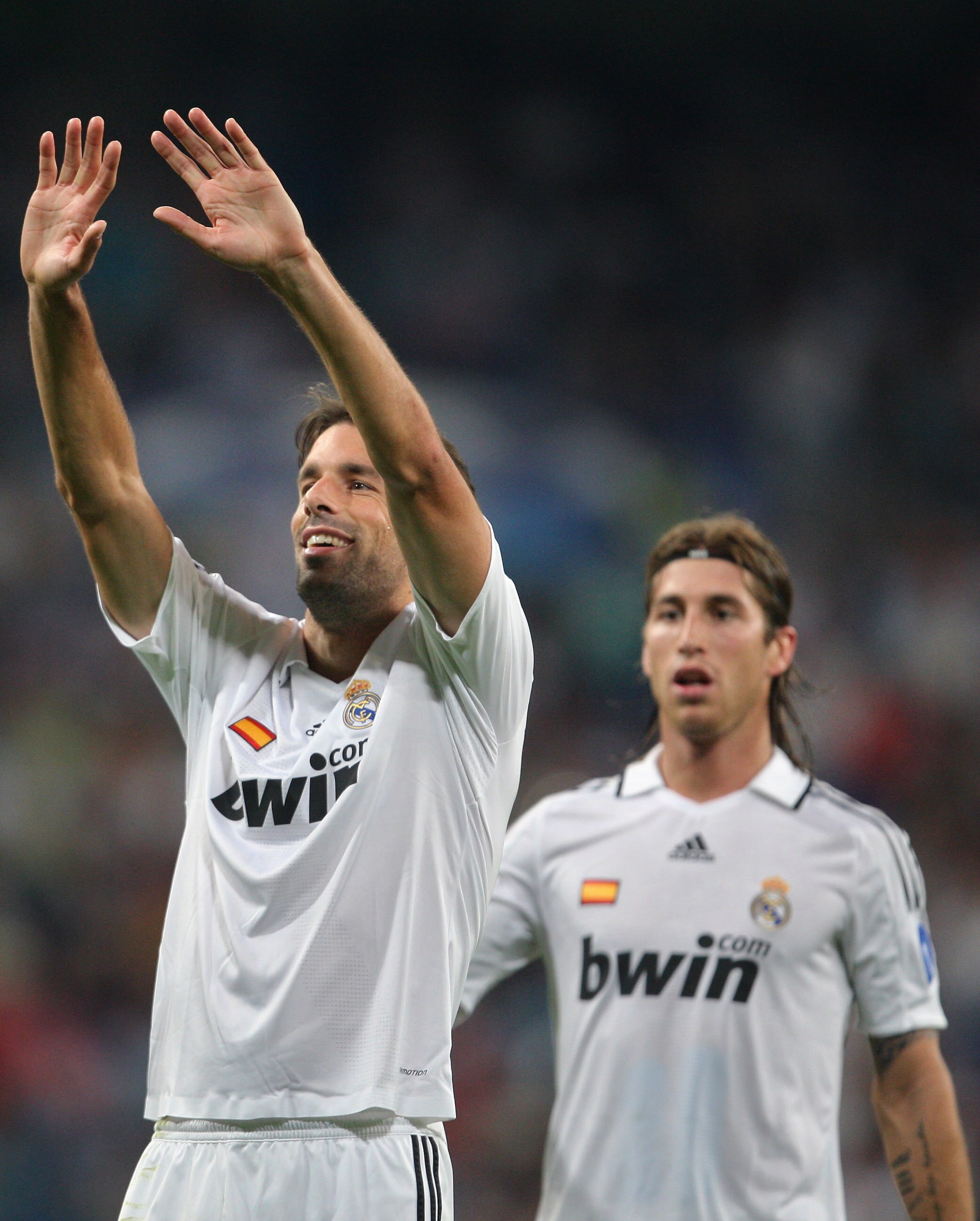 MADRID, SPAIN - SEPTEMBER 17:  Ruud van Nistelrooy of Real Madrid celebrates scoring the second goal backdropped by his teammate Sergio Ramos during the UEFA Champions League Group H match between Real Madrid and BATE Borisov at the Santiago Bernabeu stad