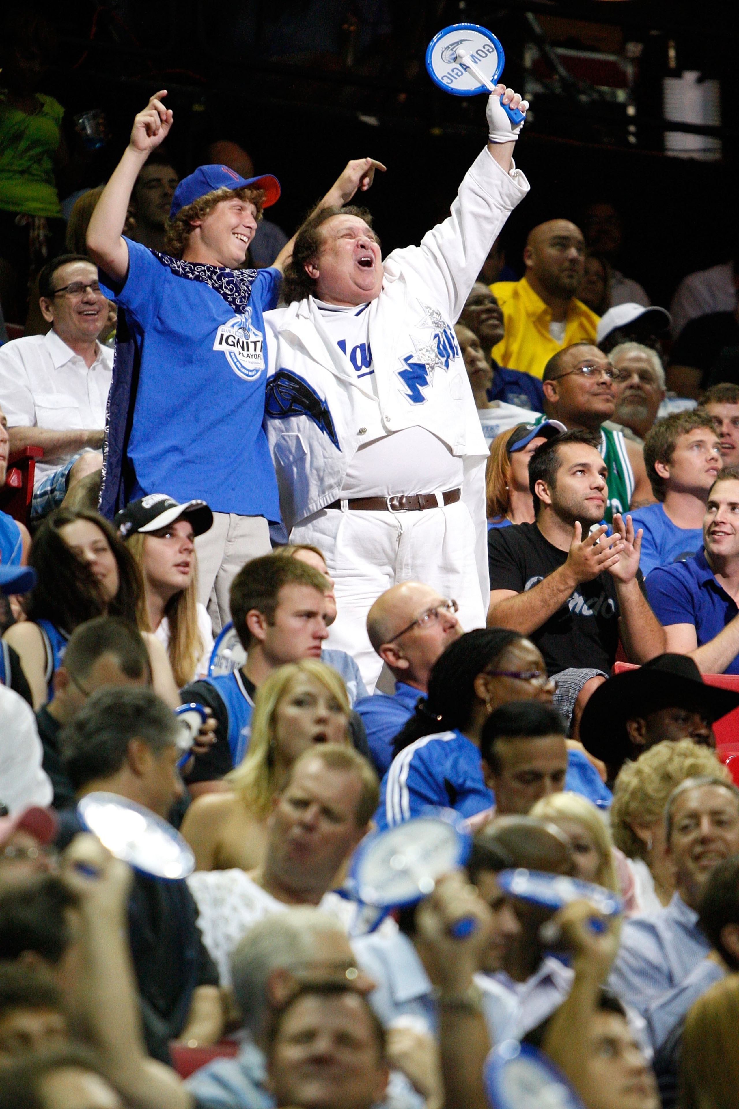 ORLANDO, FL - MAY 26: Fans of the Orlando Magic support their team against the Boston Celtics in Game Five of the Eastern Conference Finals during the 2010 NBA Playoffs at Amway Arena on May 26, 2010 in Orlando, Florida. NOTE TO USER: User expressly ack ORLANDO, FL - MAY 26: Fans of the Orlando Magic support their team against the Boston Celtics in Game Five of the Eastern Conference Finals during the 2010 NBA Playoffs at Amway Arena on May 26, 2010 in Orlando, Florida. NOTE TO USER: User expressly ack