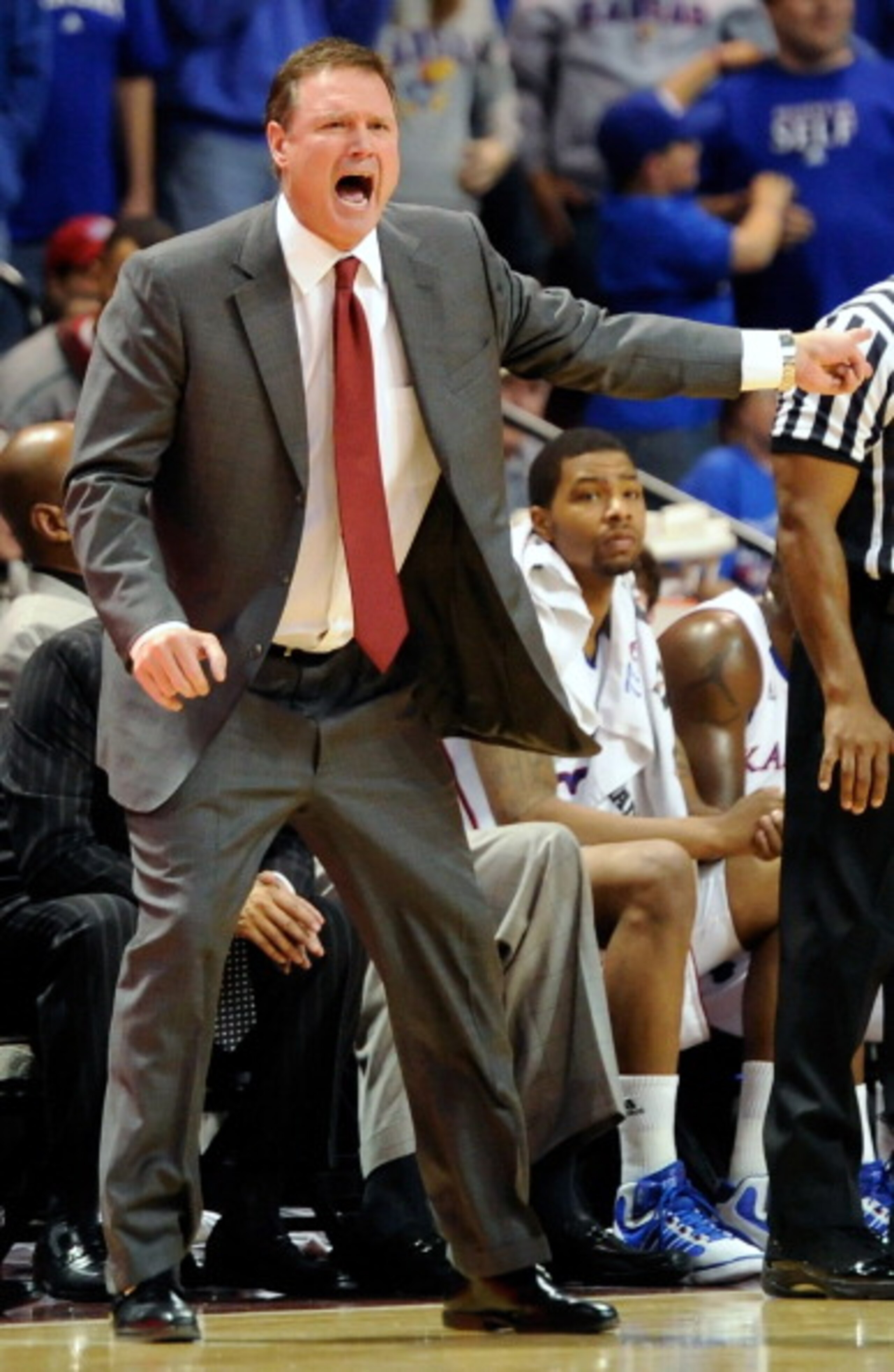 LAS VEGAS - NOVEMBER 27: Head coach Bill Self of the Kansas Jayhawks yells to his players during their 87-79 victory over the Arizona Wildcats in the championship game of the Las Vegas Invitational at The Orleans Arena November 27, 2010 in Las Vegas, Nev LAS VEGAS - NOVEMBER 27: Head coach Bill Self of the Kansas Jayhawks yells to his players during their 87-79 victory over the Arizona Wildcats in the championship game of the Las Vegas Invitational at The Orleans Arena November 27, 2010 in Las Vegas, Nev