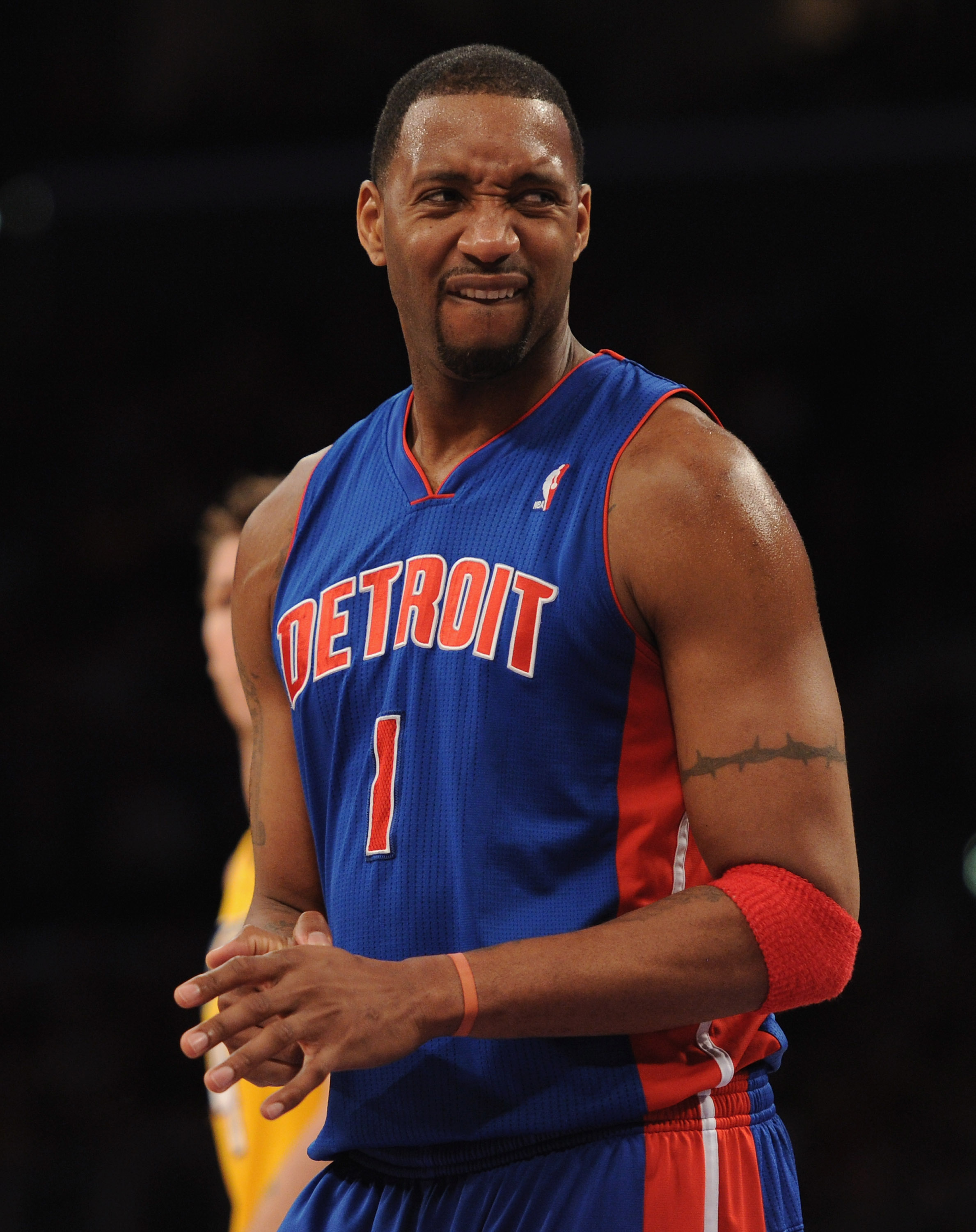 LOS ANGELES, CA - JANUARY 04:  Tracy McGrady #1 of the Detroit Pistons grimaces after a foul against the Los Angeles Lakers at the Staples Center on January 4, 2011 in Los Angeles, California. NOTE TO USER: User expressly acknowledges and agrees that, by