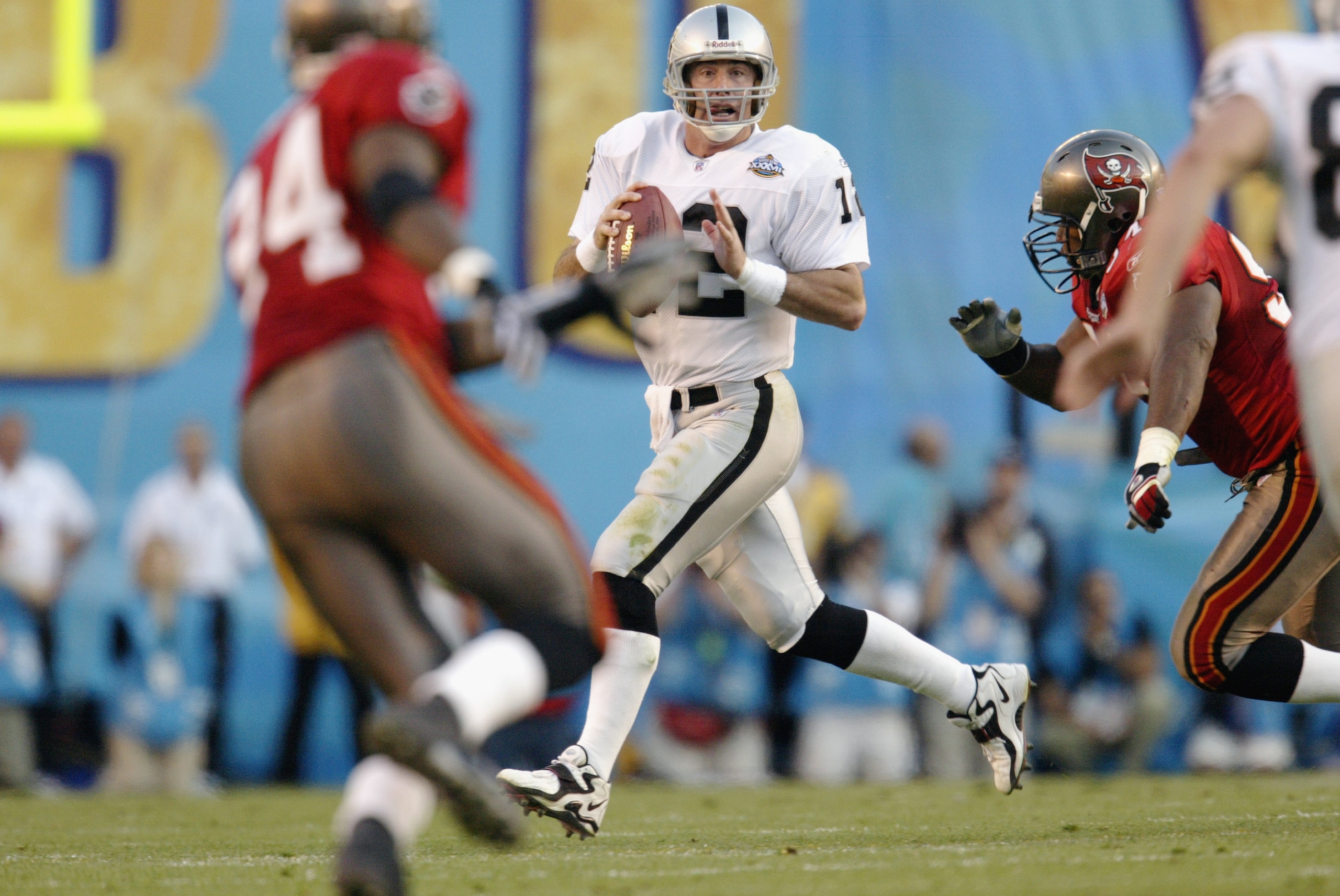 SAN DIEGO - JANUARY 26:  Quarterback Rich Gannon #12 of the Oakland Raiders scrambles against the Tampa Bay Buccaneers during Super Bowl XXXVII on January 26, 2003 at Qualcomm Stadium in San Diego, California. The Buccaneers defeated the Raiders 48-21. (P