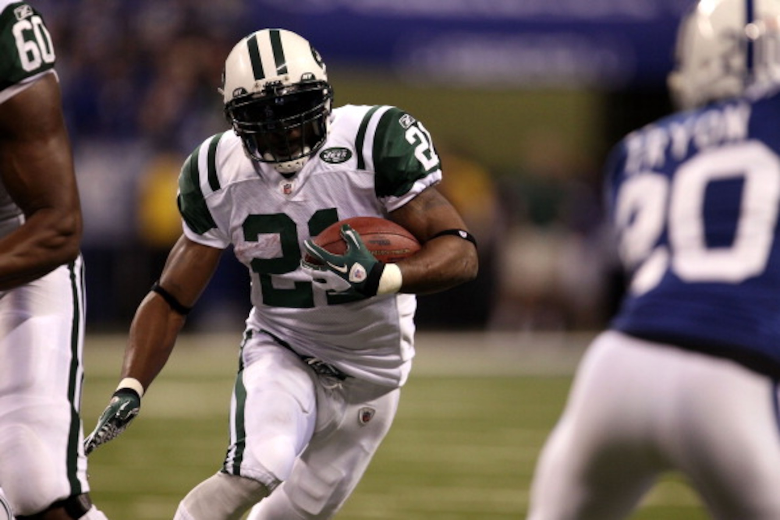 INDIANAPOLIS, IN - JANUARY 08:  LaDainian Tomlinson #21 of the New York Jets runs the ball against the Indianapolis Colts during their 2011 AFC wild card playoff game at Lucas Oil Stadium on January 8, 2011 in Indianapolis, Indiana. The Jets won 17-16. (P