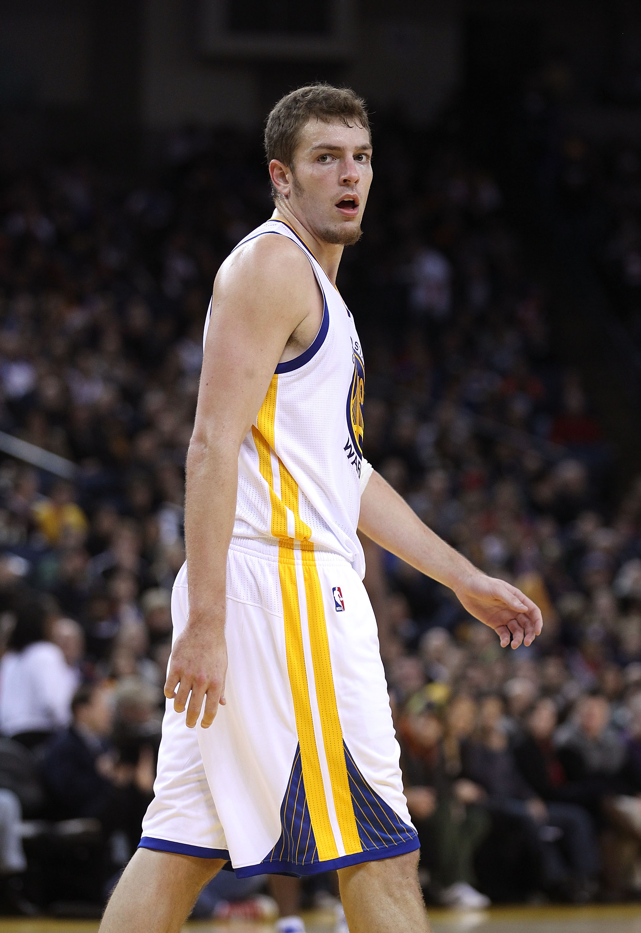 OAKLAND, CA - DECEMBER 20:  David Lee #10 of the Golden State Warriors in action against the Houston Rockets at Oracle Arena on December 20, 2010 in Oakland, California. NOTE TO USER: User expressly acknowledges and agrees that, by downloading and or usin