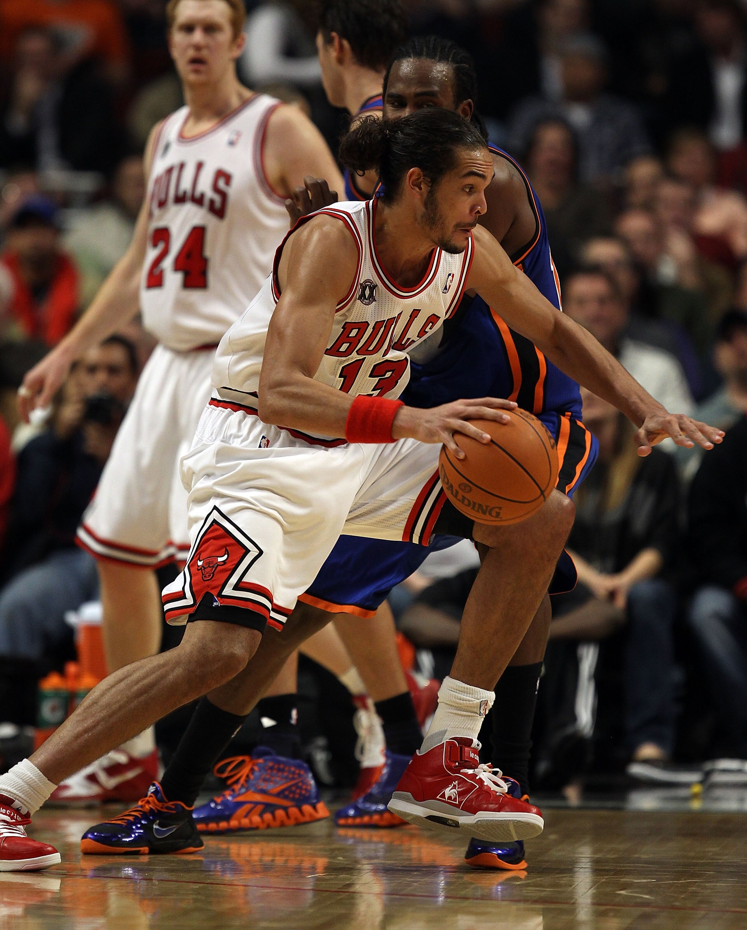 CHICAGO - NOVEMBER 04: Joakim Noah #13 of the Chicago Bulls moves against the New York Knicks at the United Center on November 4, 2010 in Chicago, Illinois. The Knicks defeated the Bulls 120-112. NOTE TO USER: User expressly acknowledges and agrees that,