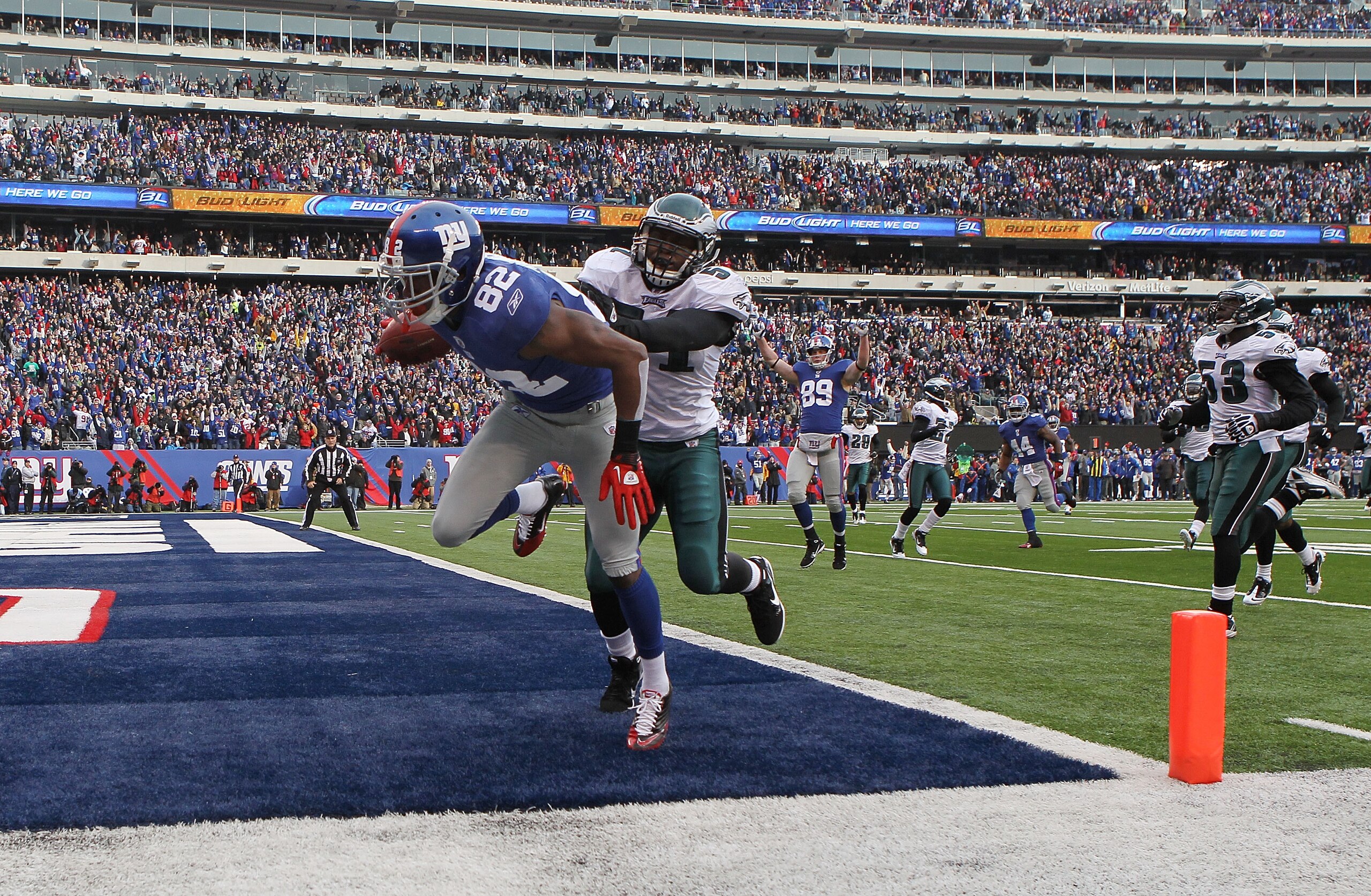 EAST RUTHERFORD, NJ - DECEMBER 19: Mario Manningham #82 of the New York Giants crosses in the corner for a touchdown against the Philadelphia Eagles at New Meadowlands Stadium on December 19, 2010 in East Rutherford, New Jersey.  (Photo by Nick Laham/Gett