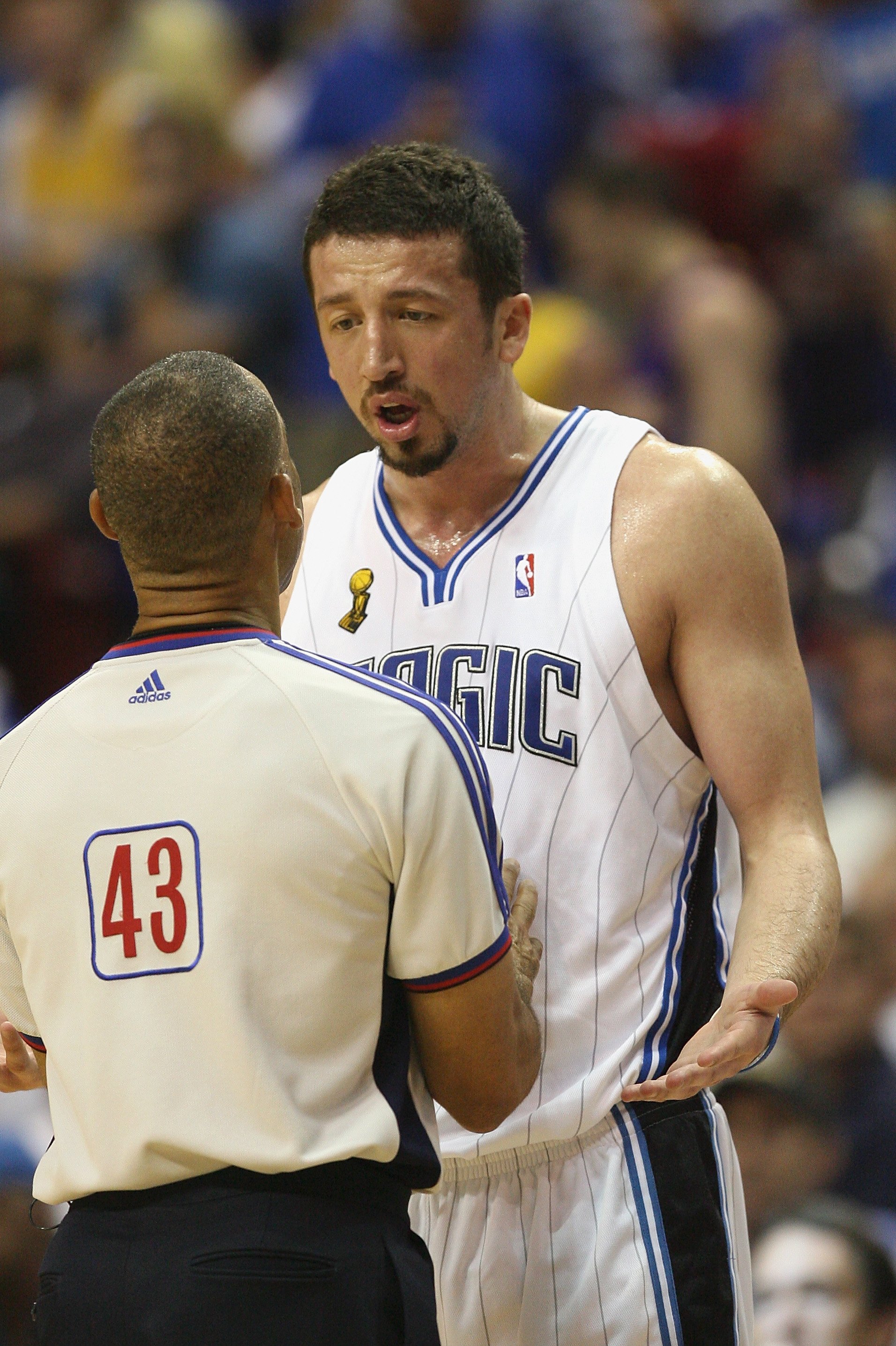 ORLANDO, FL - JUNE 14:  Hedo Turkoglu #15 of the Orlando Magic talks with referee Dan Crawford #43 during Game Five of the 2009 NBA Finals against the Los Angeles Lakers on June 14, 2009 at Amway Arena in Orlando, Florida. The Lakers won 99-86. NOTE TO US