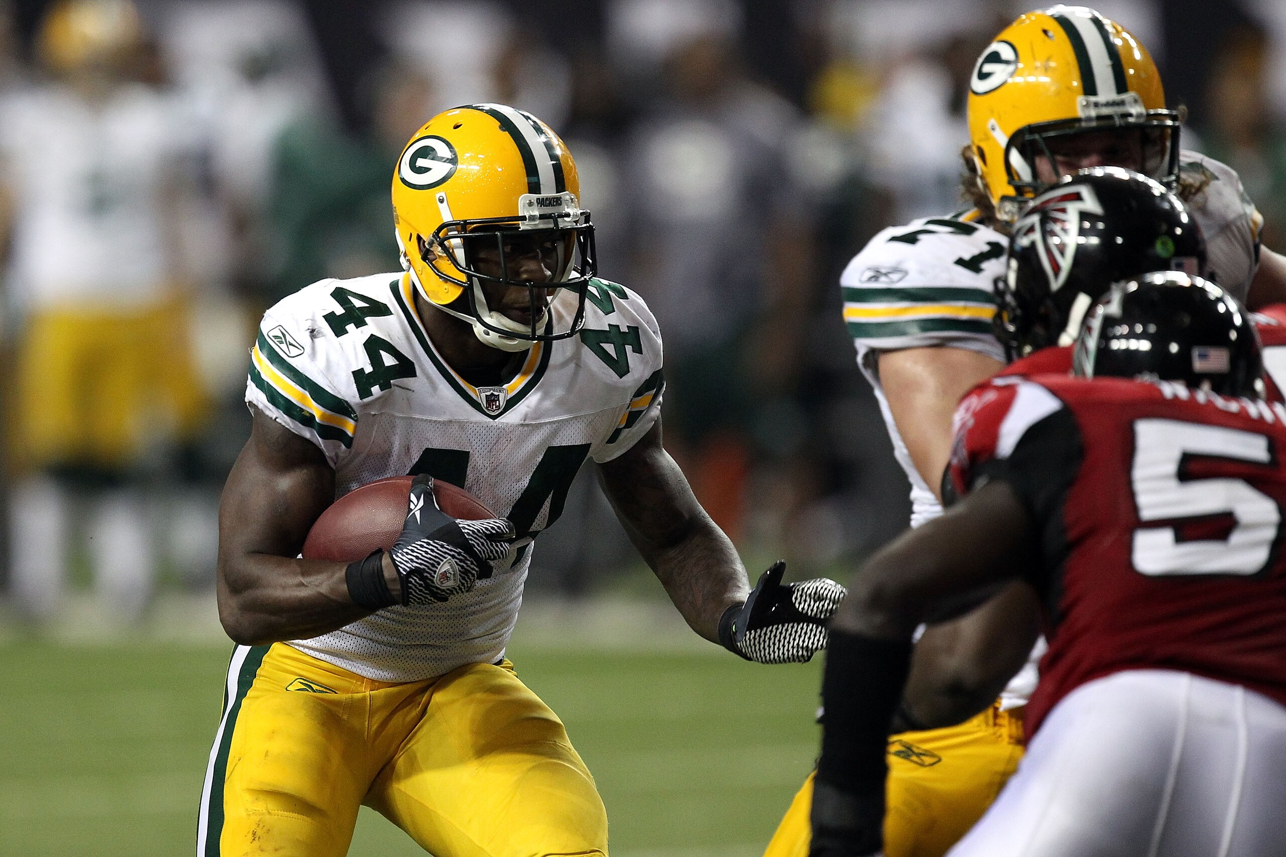 ATLANTA, GA - JANUARY 15:  James Starks #44 of the Green Bay Packers runs the ball against the Atlanta Falcons during their 2011 NFC divisional playoff game at Georgia Dome on January 15, 2011 in Atlanta, Georgia.  (Photo by Streeter Lecka/Getty Images)