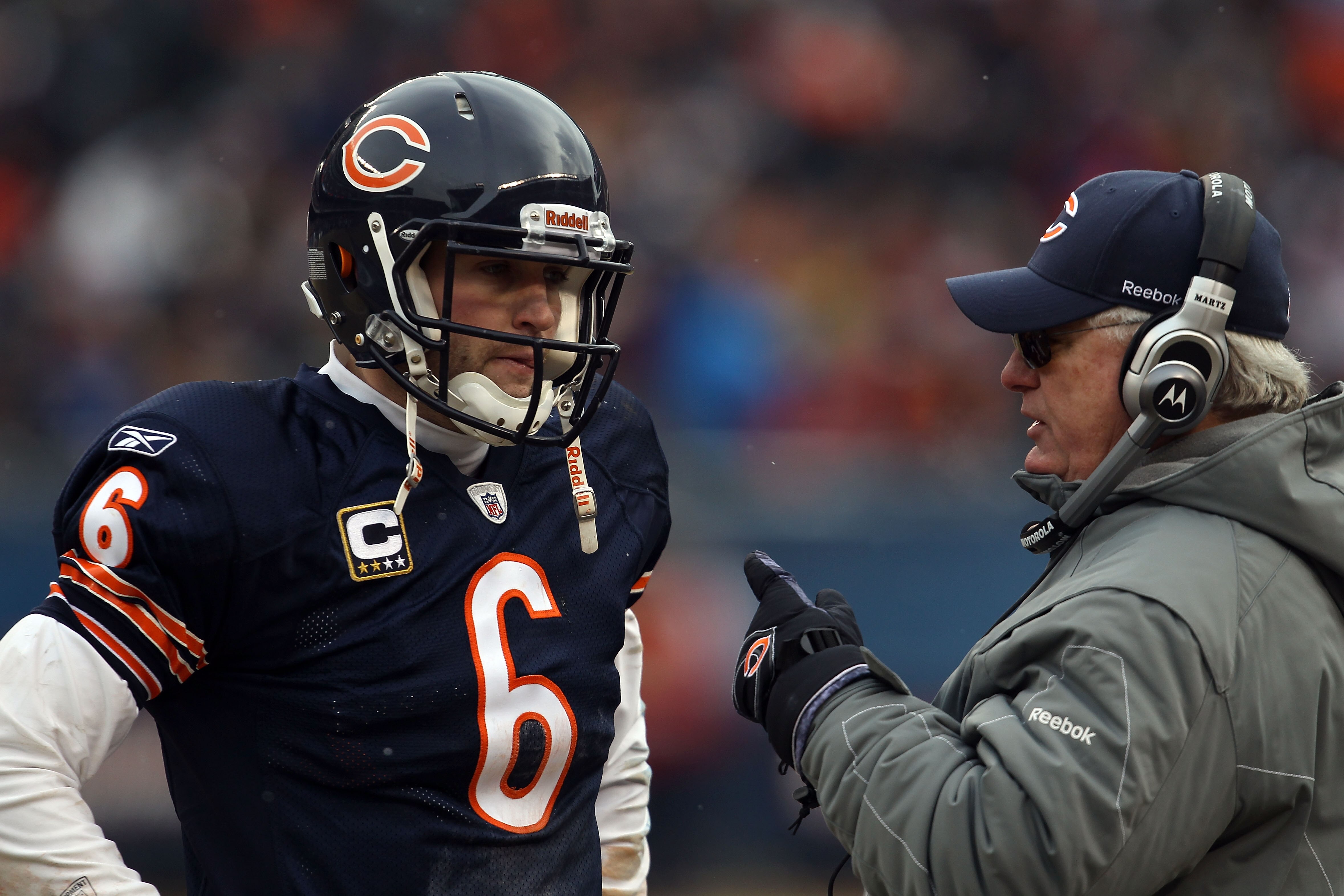 CHICAGO, IL - JANUARY 16:  Quarterback Jay Cutler #6 of the Chicago Bears talks with offensive coordinator Mike Martz in the second half against the Seattle Seahawks in the 2011 NFC divisional playoff game at Soldier Field on January 16, 2011 in Chicago,