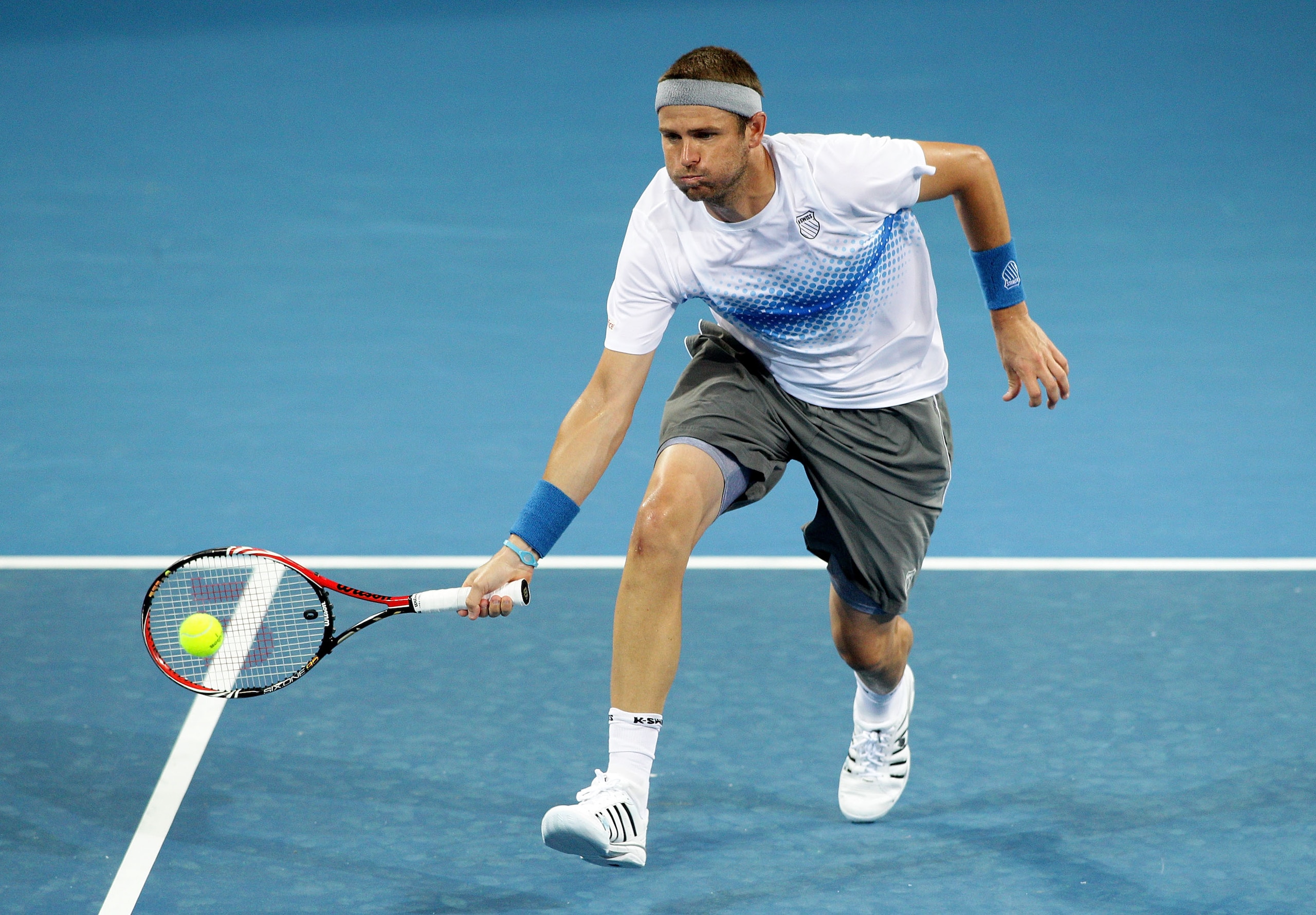 BRISBANE, AUSTRALIA - JANUARY 05: Mardy Fish of the USA volleys during his second round match against Radek Stepanek of the Czech Republic during day four of the Brisbane International at Queensland Tennis Centre on January 5, 2011 in Brisbane, Australia BRISBANE, AUSTRALIA - JANUARY 05: Mardy Fish of the USA volleys during his second round match against Radek Stepanek of the Czech Republic during day four of the Brisbane International at Queensland Tennis Centre on January 5, 2011 in Brisbane, Australia