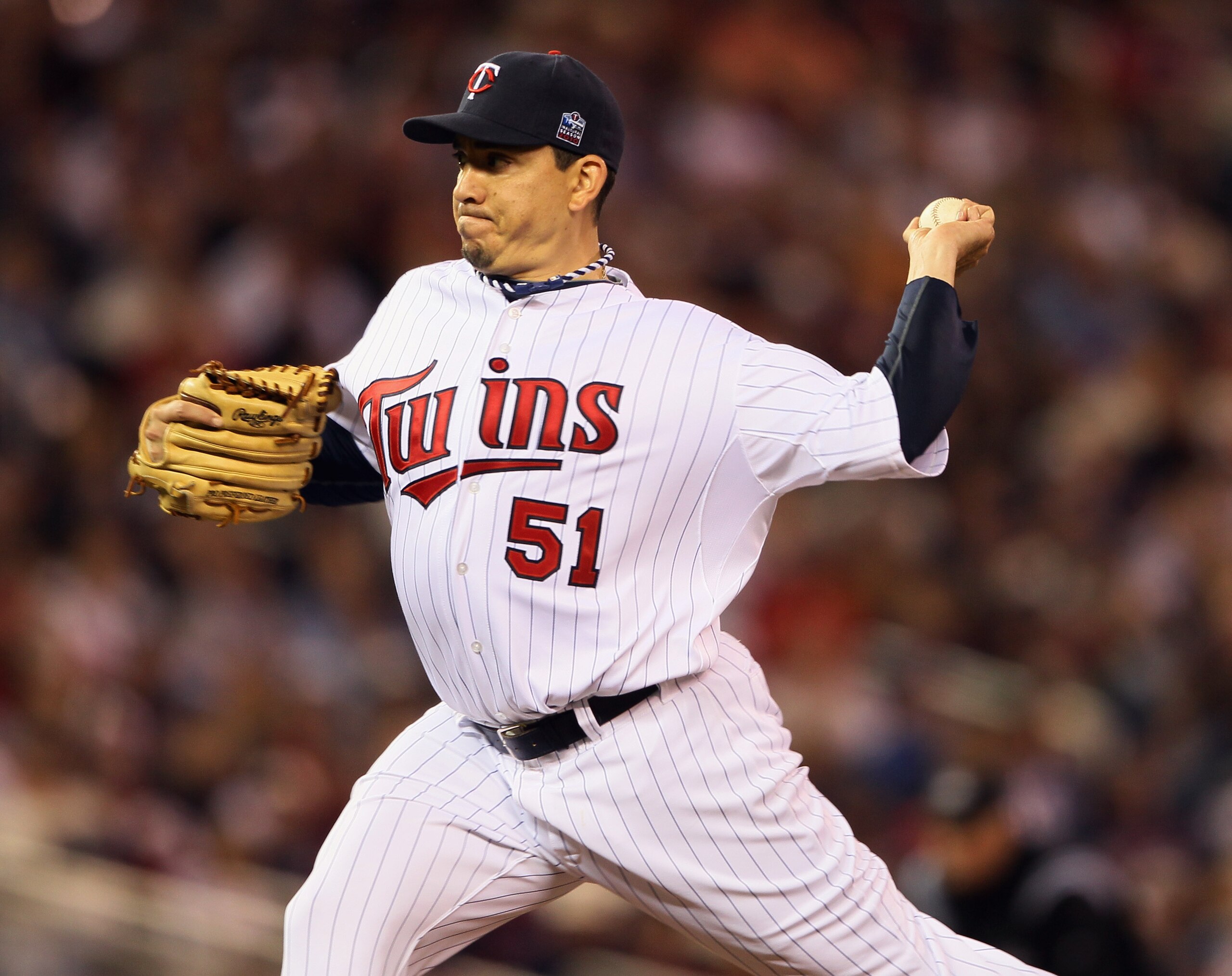 MINNEAPOLIS - OCTOBER 06: Brian Fuentes #51 of the Minnesota Twins delivers a pitch against the New York Yankees during game one of the ALDS on October 6, 2010 at Target Field in Minneapolis, Minnesota. The Yankees defeated the Twins 6-4. (Photo by Elsa MINNEAPOLIS - OCTOBER 06: Brian Fuentes #51 of the Minnesota Twins delivers a pitch against the New York Yankees during game one of the ALDS on October 6, 2010 at Target Field in Minneapolis, Minnesota. The Yankees defeated the Twins 6-4. (Photo by Elsa