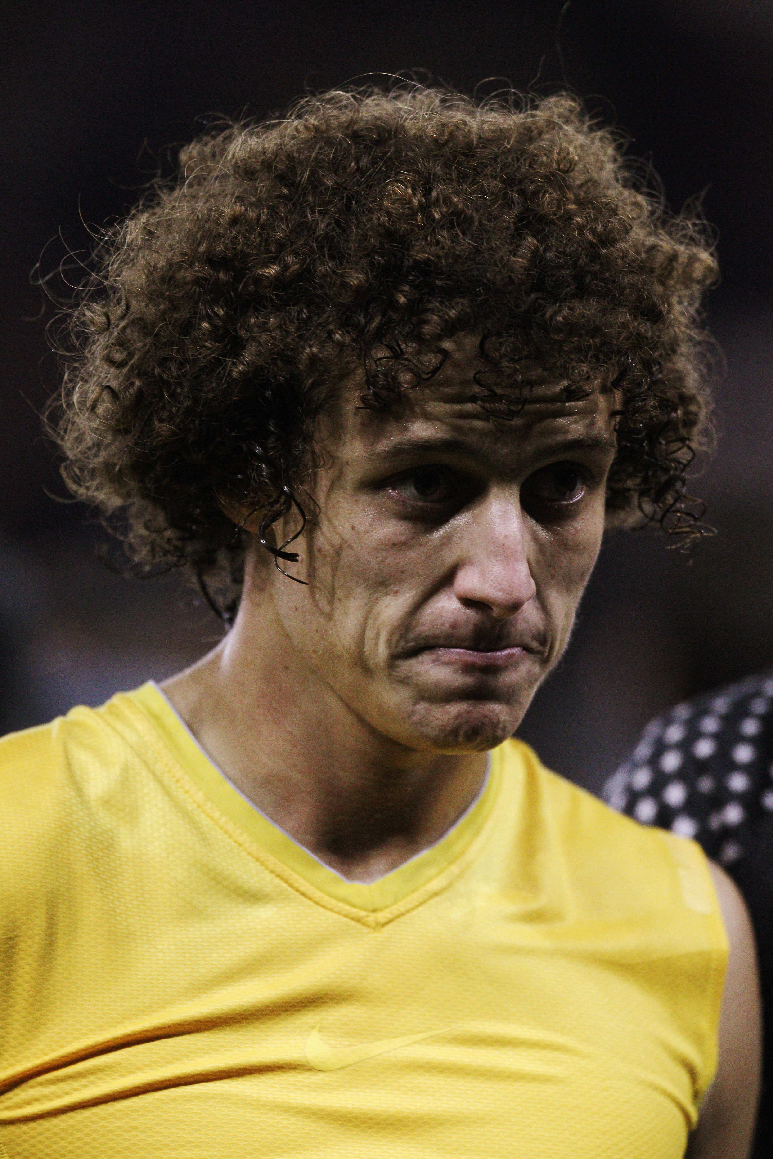 DERBY, ENGLAND - OCTOBER 11:  David Luiz of Brazil  looks on after the International Friendly match between Brazil and Ukraine at Pride Park Stadium on October 11, 2010 in Derby, England.  (Photo by Dean Mouhtaropoulos/Getty Images)