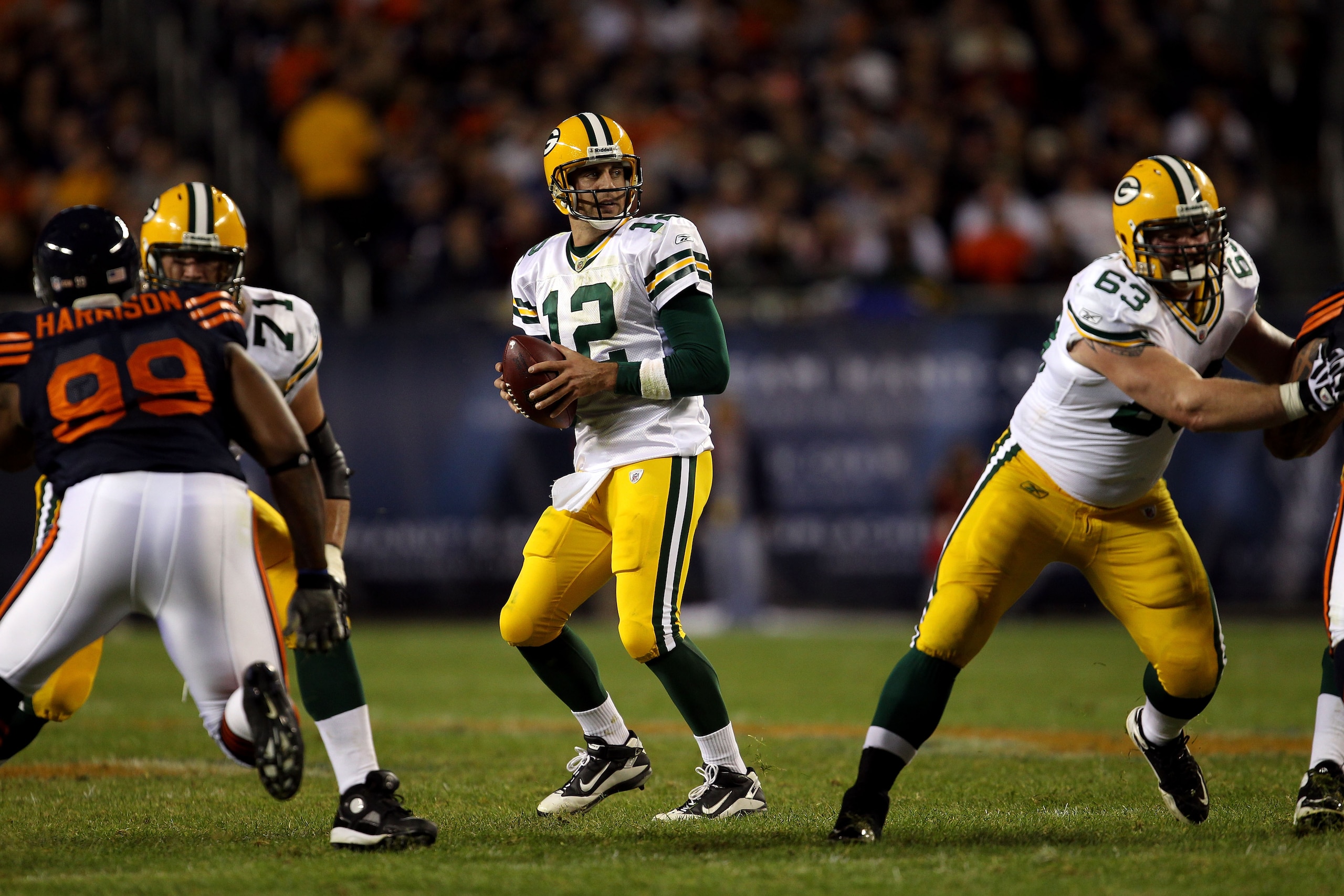 CHICAGO - SEPTEMBER 27:  Aaron Rodgers #12 of the Green Bay Packers drops back to pass against the Chicago Bears at Soldier Field on September 27, 2010 in Chicago, Illinois. The Bears won 20-17.  (Photo by Jonathan Daniel/Getty Images)