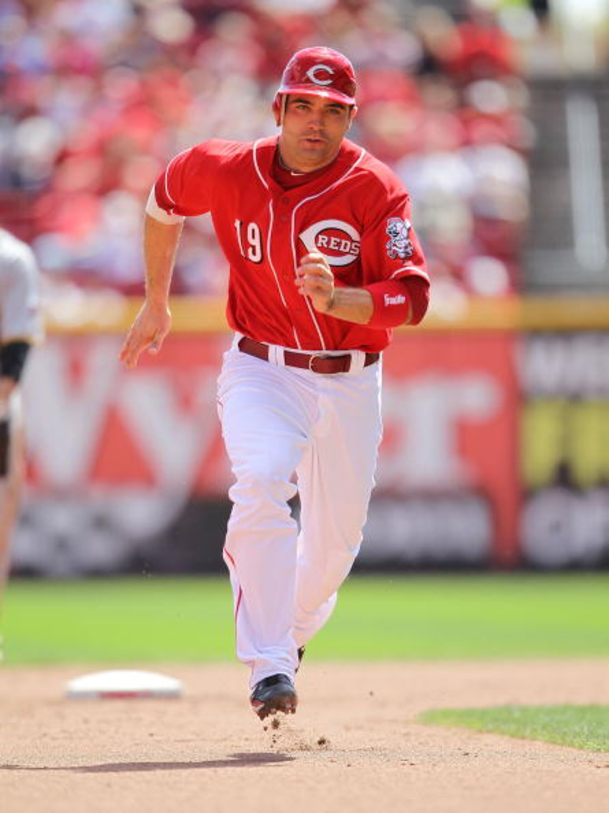 CINCINNATI - SEPTEMBER 12: Joey Votto #19 of the Cincinnati Reds runs to third base in the fourth inning during the game against the Pittsburgh Pirates at Great American Ballpark on September 12, 2010 in Cincinnati, Ohio. (Photo by Andy Lyons/Getty Ima CINCINNATI - SEPTEMBER 12: Joey Votto #19 of the Cincinnati Reds runs to third base in the fourth inning during the game against the Pittsburgh Pirates at Great American Ballpark on September 12, 2010 in Cincinnati, Ohio. (Photo by Andy Lyons/Getty Ima