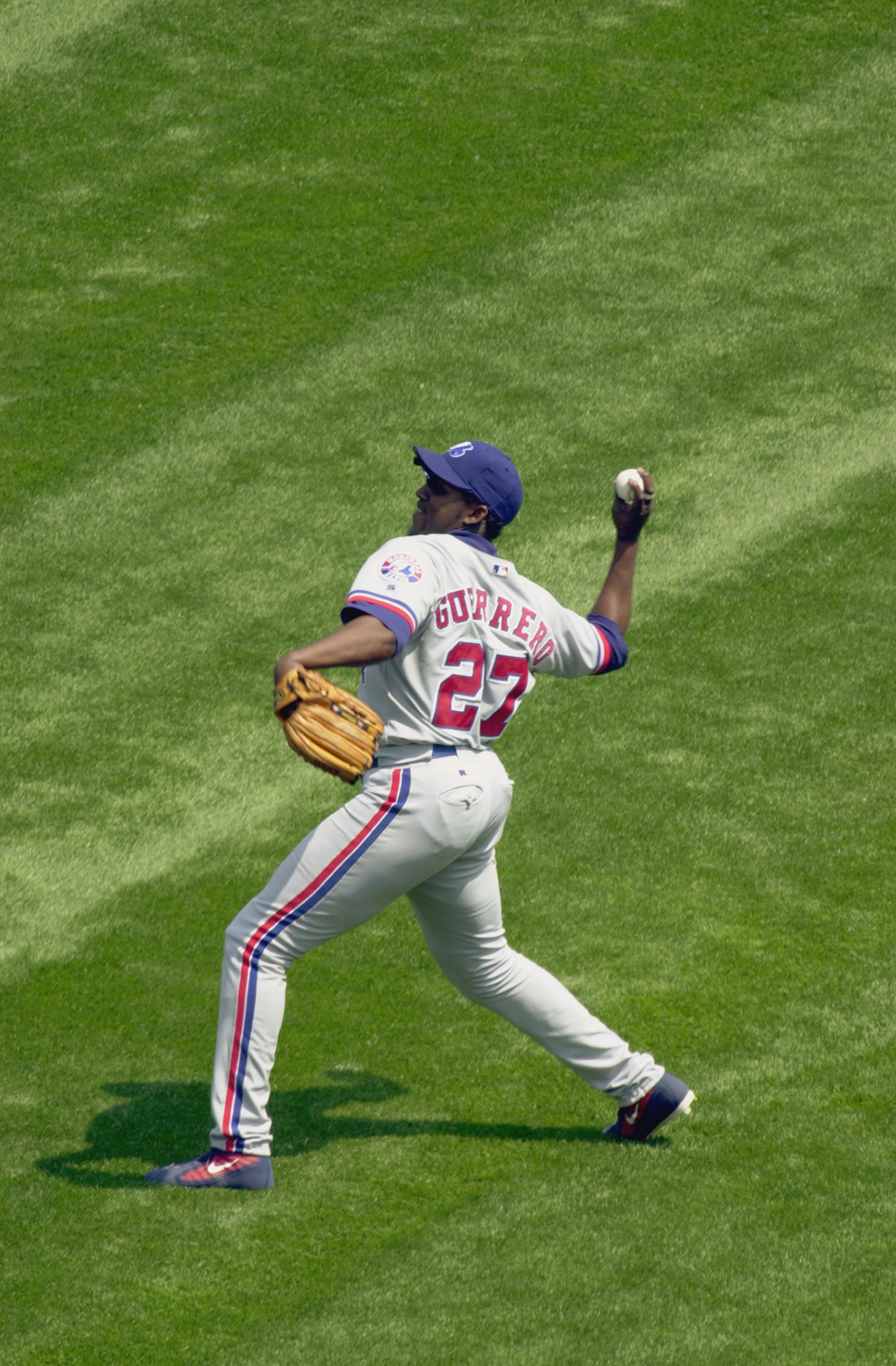 CHICAGO-JUNE 9:  Right fielder Vladimir Guerrero #27 of the Montreal Expos throws the ball back to the infield during the Interleague MLB game against the Chicago White Sox on June 9, 2002 at Comiskey Park in Chicago, Illinois. The White Sox won 13-2.  (P