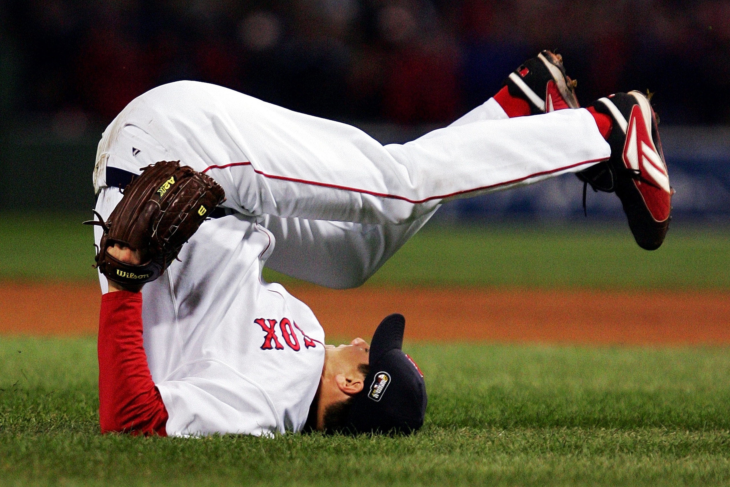 BOSTON - OCTOBER 25: Jonathan Papelbon #58 of the Boston Red Sox flips over after a ball was hit up the middle by the Colorado Rockies during Game Two of the 2007 Major League Baseball World Series at Fenway Park on October 25, 2007 in Boston, Massachuse BOSTON - OCTOBER 25: Jonathan Papelbon #58 of the Boston Red Sox flips over after a ball was hit up the middle by the Colorado Rockies during Game Two of the 2007 Major League Baseball World Series at Fenway Park on October 25, 2007 in Boston, Massachuse