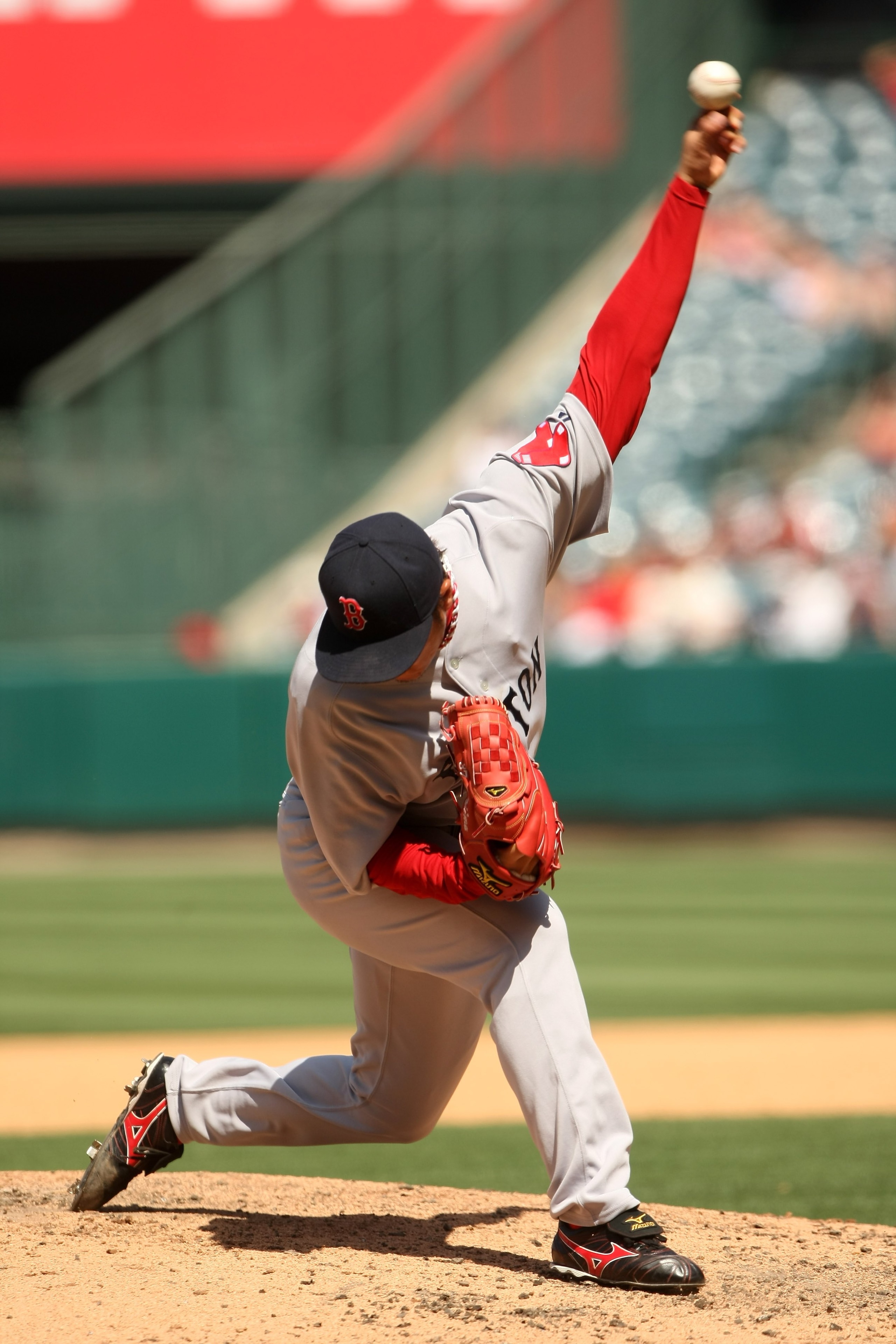 ANAHEIM, CA - MAY 14: Pitcher Hideki Okajima #37 of the Boston Red Sox throws a pitch against the Los Angeles Angels of Anaheim on May 14, 2009 at Angel Stadium in Anaheim, California. The Angels won 5-4 in 12 innings. (Photo by Stephen Dunn/Getty Ima ANAHEIM, CA - MAY 14: Pitcher Hideki Okajima #37 of the Boston Red Sox throws a pitch against the Los Angeles Angels of Anaheim on May 14, 2009 at Angel Stadium in Anaheim, California. The Angels won 5-4 in 12 innings. (Photo by Stephen Dunn/Getty Ima
