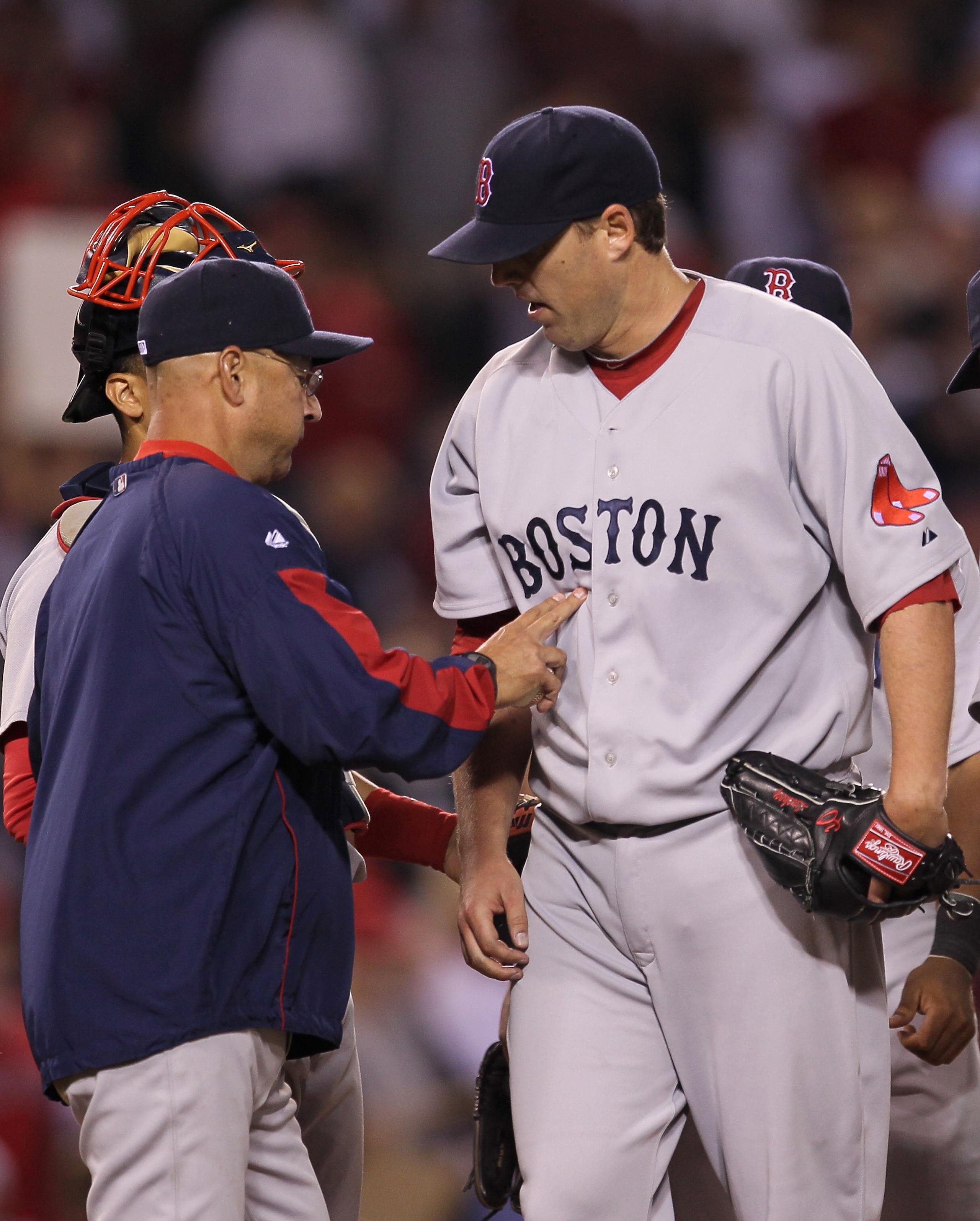 ANAHEIM, CA - JULY 27: Manager Terry Francona of the Boston Red Sox relieves starting pitcher John Lackey #40 in the eighth inning of the game with the Los Angeles Angels of Anaheim on July 27, 2010 at Angel Stadium in Anaheim, California. (Photo by Ste ANAHEIM, CA - JULY 27: Manager Terry Francona of the Boston Red Sox relieves starting pitcher John Lackey #40 in the eighth inning of the game with the Los Angeles Angels of Anaheim on July 27, 2010 at Angel Stadium in Anaheim, California. (Photo by Ste