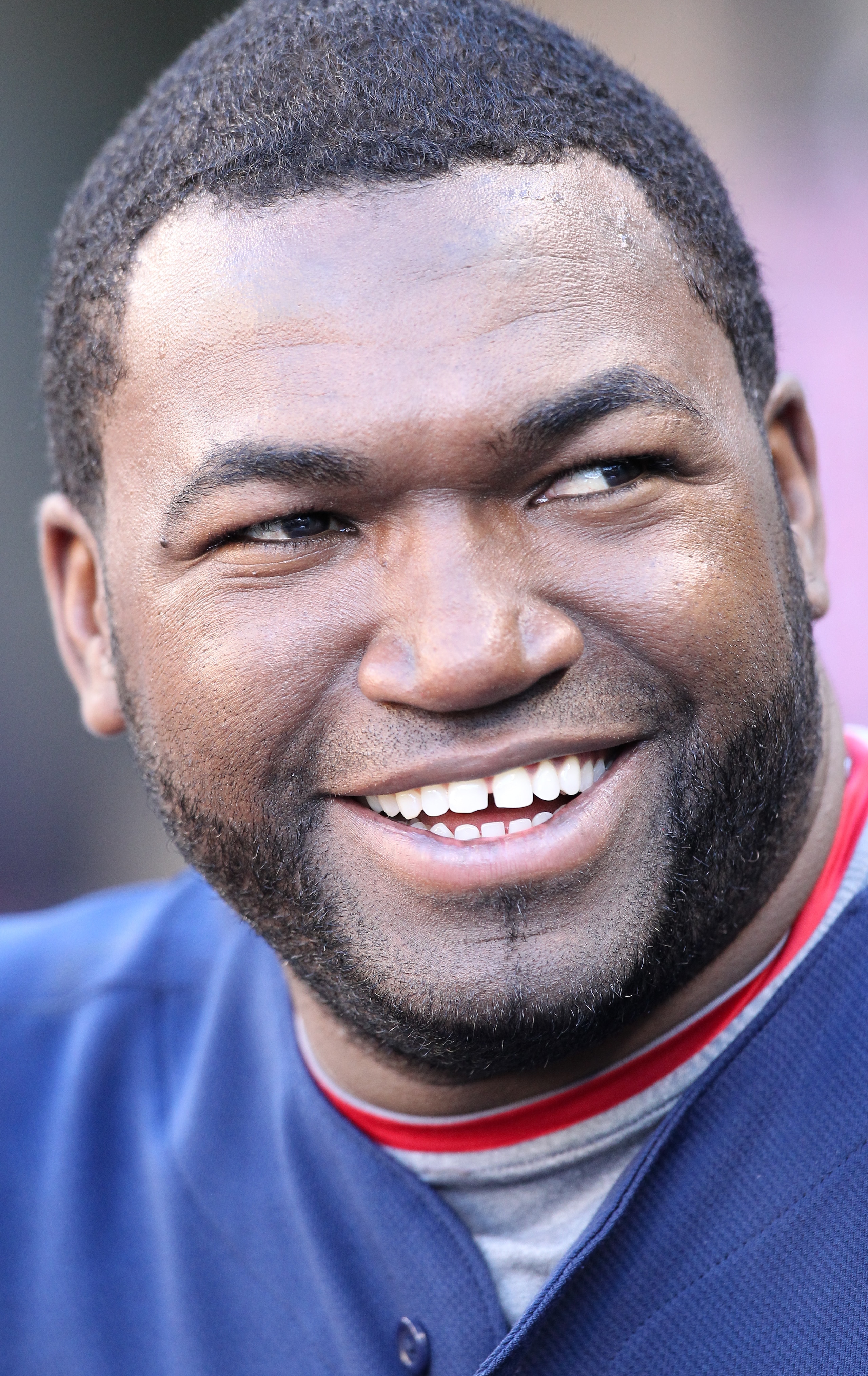 SEATTLE - JULY 24: David Ortiz #34 of the Boston Red Sox smiles in the dugout prior to the game against the Seattle Mariners at Safeco Field on July 24, 2010 in Seattle, Washington. (Photo by Otto Greule Jr/Getty Images) SEATTLE - JULY 24: David Ortiz #34 of the Boston Red Sox smiles in the dugout prior to the game against the Seattle Mariners at Safeco Field on July 24, 2010 in Seattle, Washington. (Photo by Otto Greule Jr/Getty Images)