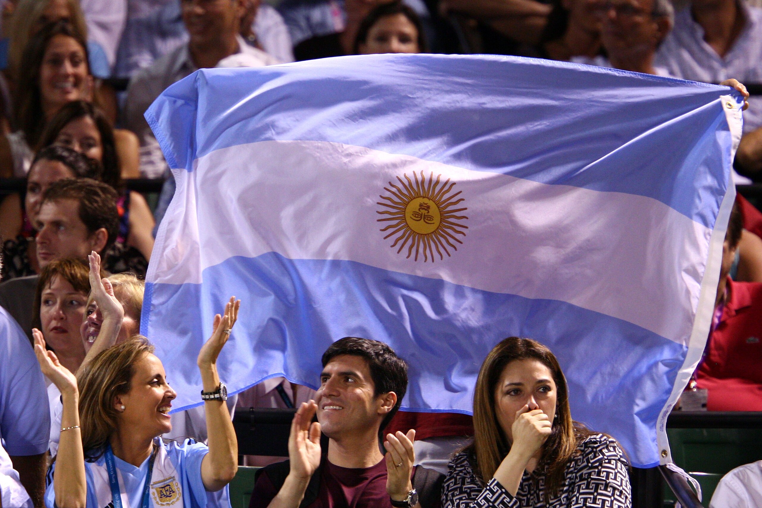 KEY BISCAYNE, FL - APRIL 03:  Fans Juan Martin Del Potro of Argentina hold up his country's flag as he plays against Andy Murray of Great Britain during the men's semifinal of the Sony Ericsson Open at the Crandon Park Tennis Center on April 3, 2009 in Ke