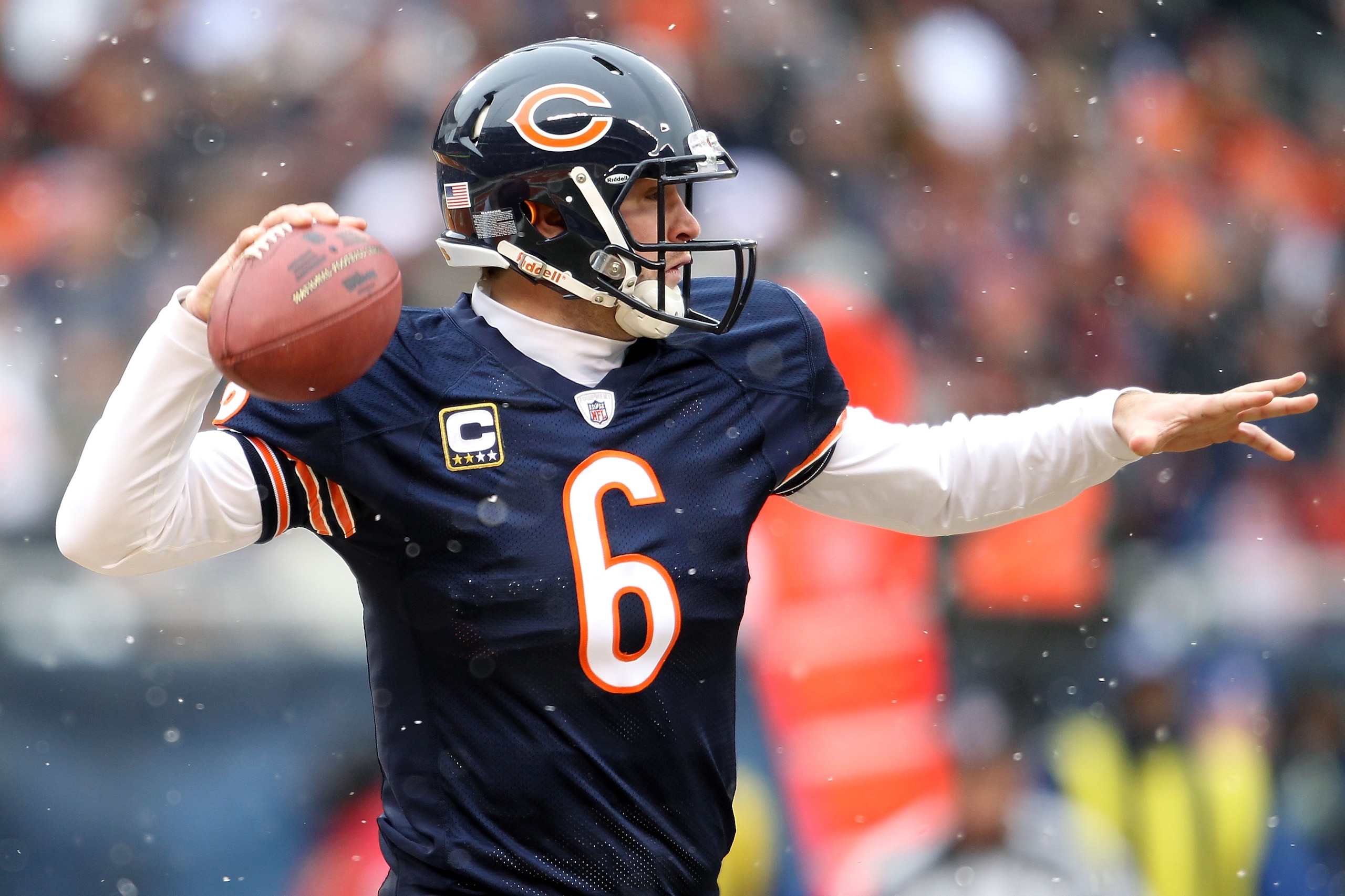 CHICAGO, IL - JANUARY 16:  Quarterback Jay Cutler #6 of the Chicago Bears throws the ball in the first half against the Seattle Seahawks in the 2011 NFC divisional playoff game at Soldier Field on January 16, 2011 in Chicago, Illinois.  (Photo by Andy Lyo