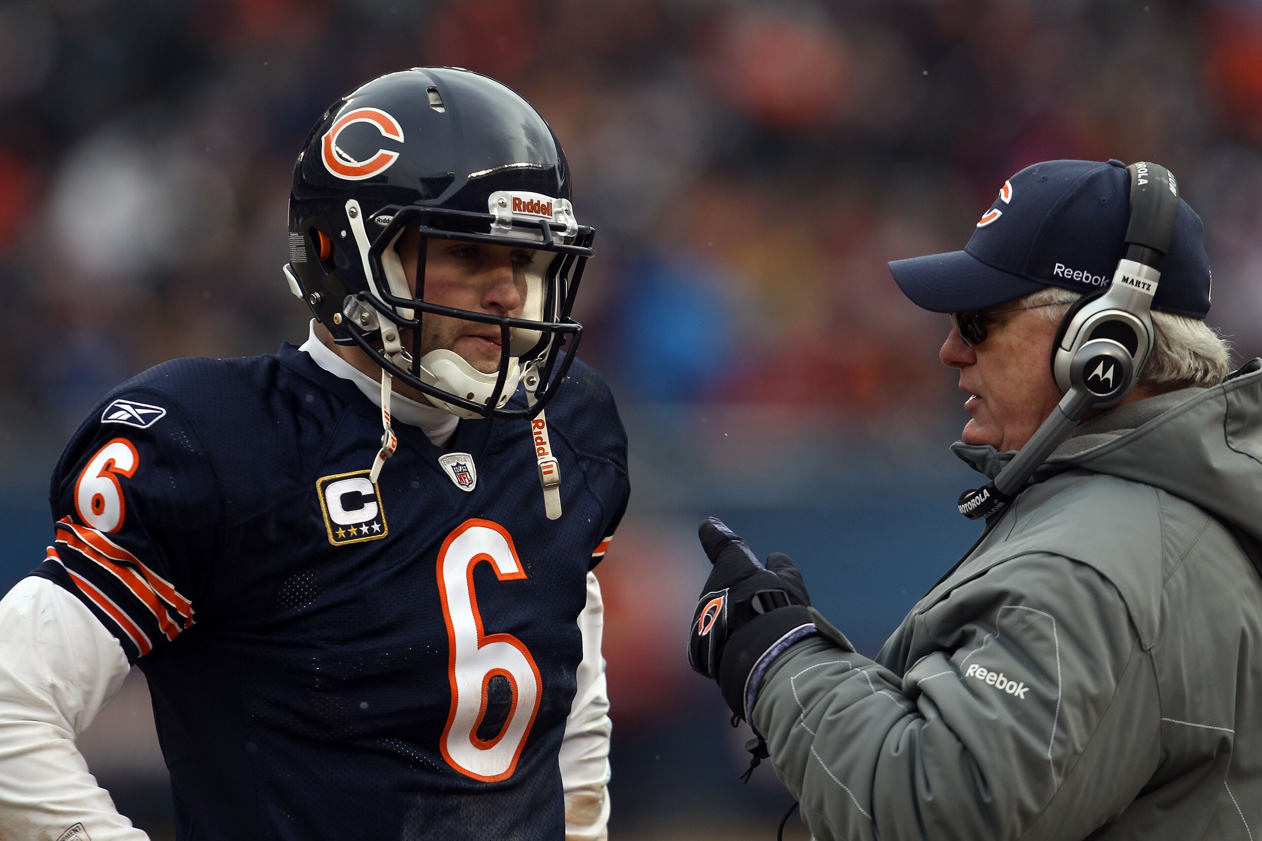 CHICAGO, IL - JANUARY 16:  Quarterback Jay Cutler #6 of the Chicago Bears talks with offensive coordinator Mike Martz in the second half against the Seattle Seahawks in the 2011 NFC divisional playoff game at Soldier Field on January 16, 2011 in Chicago,
