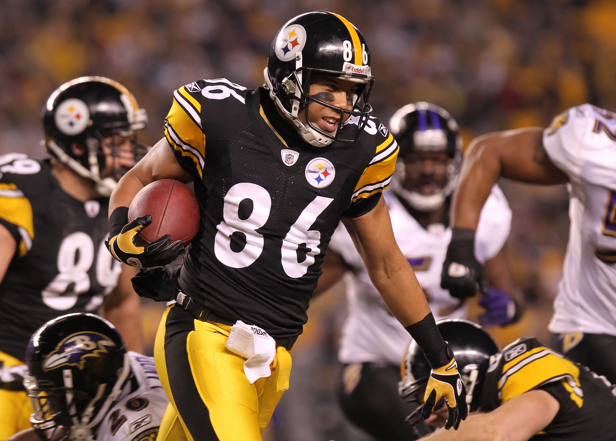 PITTSBURGH, PA - JANUARY 15: Wide receiver Hines Ward #86 of the Pittsburgh Steelers runs with the ball against the Baltimore Ravens in the AFC Divisional Playoff Game at Heinz Field on January 15, 2011 in Pittsburgh, Pennsylvania. (Photo by Nick Laham/ PITTSBURGH, PA - JANUARY 15: Wide receiver Hines Ward #86 of the Pittsburgh Steelers runs with the ball against the Baltimore Ravens in the AFC Divisional Playoff Game at Heinz Field on January 15, 2011 in Pittsburgh, Pennsylvania. (Photo by Nick Laham/