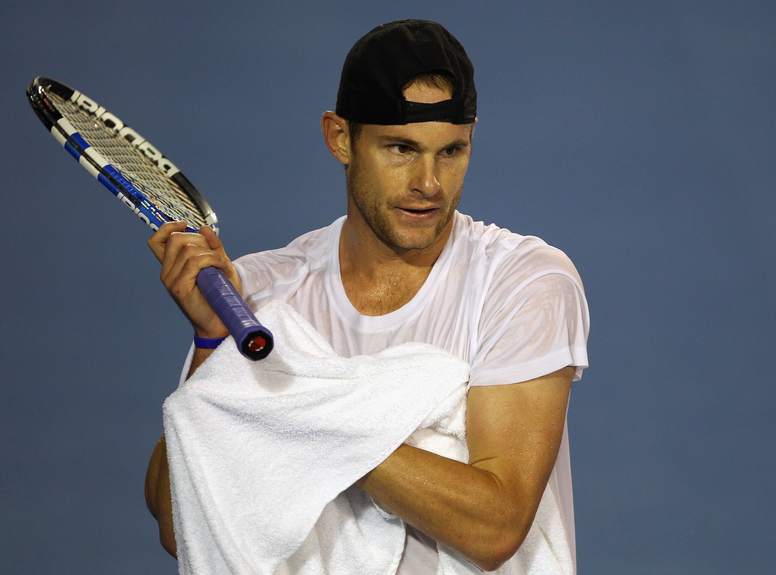 MELBOURNE, AUSTRALIA - JANUARY 12: Andy Roddick of the USA towells down during a practice session ahead of the 2011 Australian Open at Melbourne Park on January 12, 2011 in Melbourne, Australia. (Photo by Mark Dadswell/Getty Images) MELBOURNE, AUSTRALIA - JANUARY 12: Andy Roddick of the USA towells down during a practice session ahead of the 2011 Australian Open at Melbourne Park on January 12, 2011 in Melbourne, Australia. (Photo by Mark Dadswell/Getty Images)