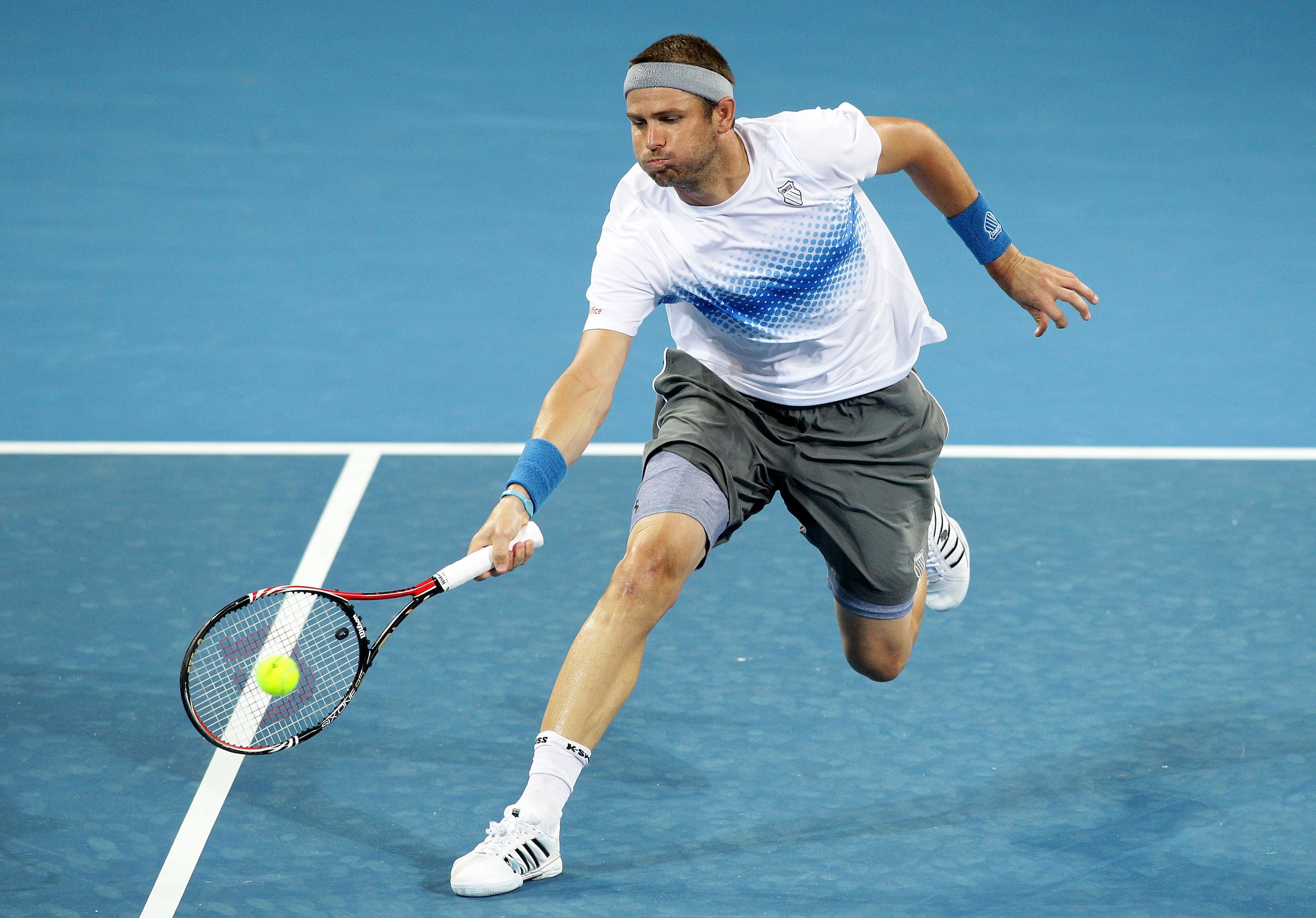 BRISBANE, AUSTRALIA - JANUARY 05: Mardy Fish of the USA volleys during his second round match against Radek Stepanek of the Czech Republic during day four of the Brisbane International at Queensland Tennis Centre on January 5, 2011 in Brisbane, Australia BRISBANE, AUSTRALIA - JANUARY 05: Mardy Fish of the USA volleys during his second round match against Radek Stepanek of the Czech Republic during day four of the Brisbane International at Queensland Tennis Centre on January 5, 2011 in Brisbane, Australia