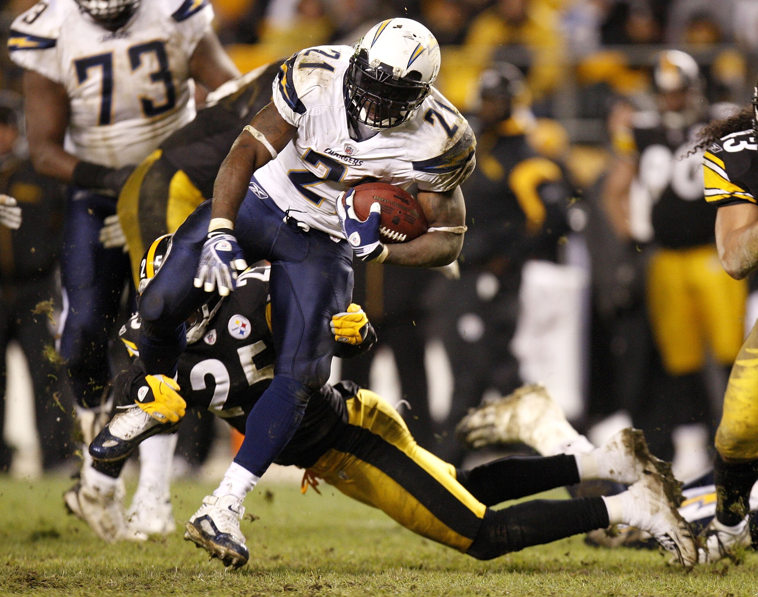 PITTSBURGH - NOVEMBER 16:  LaDanian Tomlinson #21 of the San Diego Chargers tries to escape the tackle of Ryan Clark #25 of the Pittsburgh Steelers during the fourth quarter on November 16, 2008 at Heinz Field in Pittsburgh, Pennsylvania. Pittsburgh won t