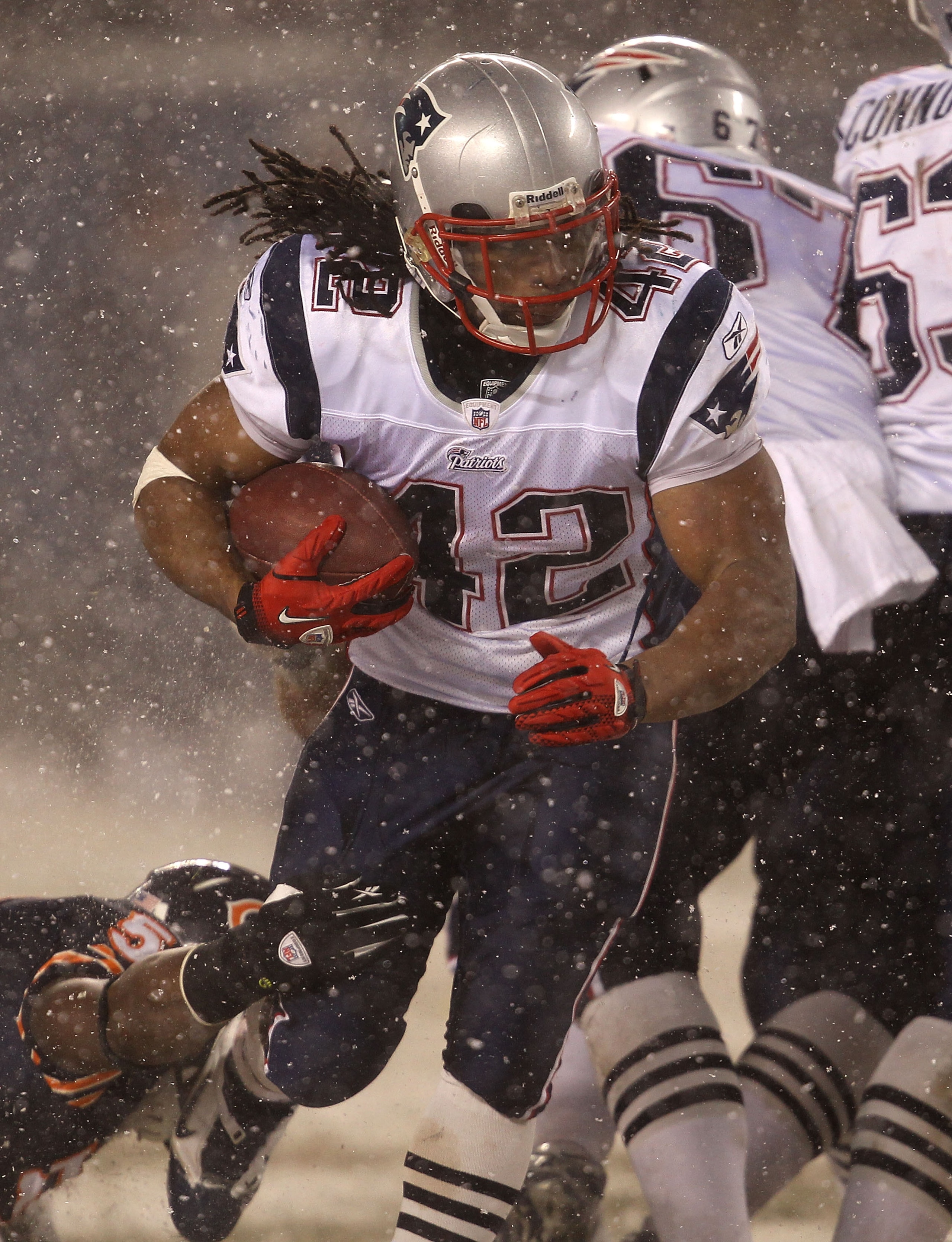 CHICAGO - DECEMBER 12: BenJarvus Green-Ellis #42 of the New England Patriots runs against the Chicago Bears at Soldier Field on December 12, 2010 in Chicago, Illinois. The Patriots defeated the Bears 36-7. (Photo by Jonathan Daniel/Getty Images)