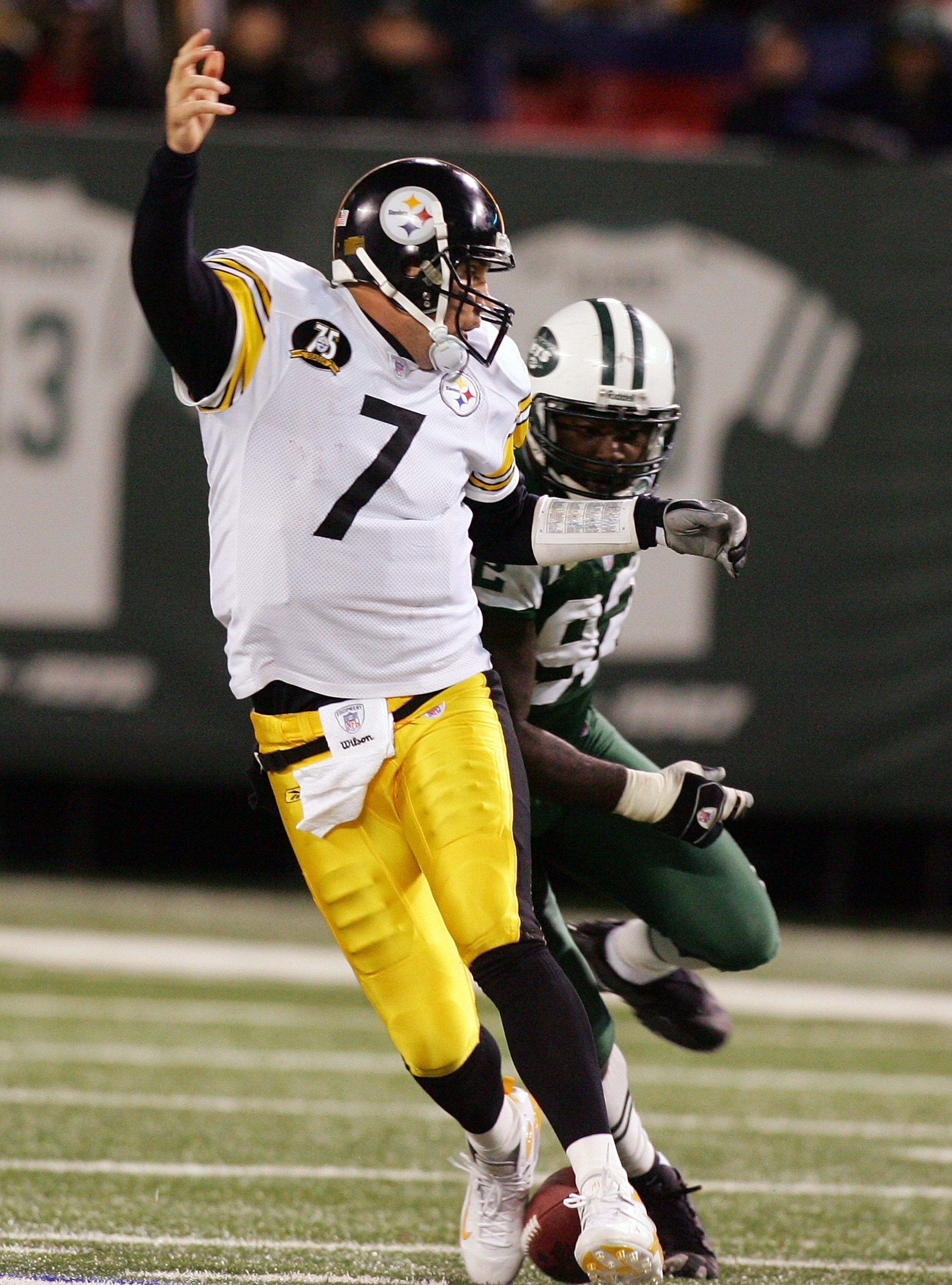 EAST RUTHERFORD, NJ - NOVEMBER 18: Shaun Ellis #92 of the New York Jets forces a fumble by Ben Roethlisberger #7 of the Pittsburgh Steelers at Giants Stadium November 18, 2007 in East Rutherford, New Jersey. The Jets defeated the Steelers 19-16 in overtim