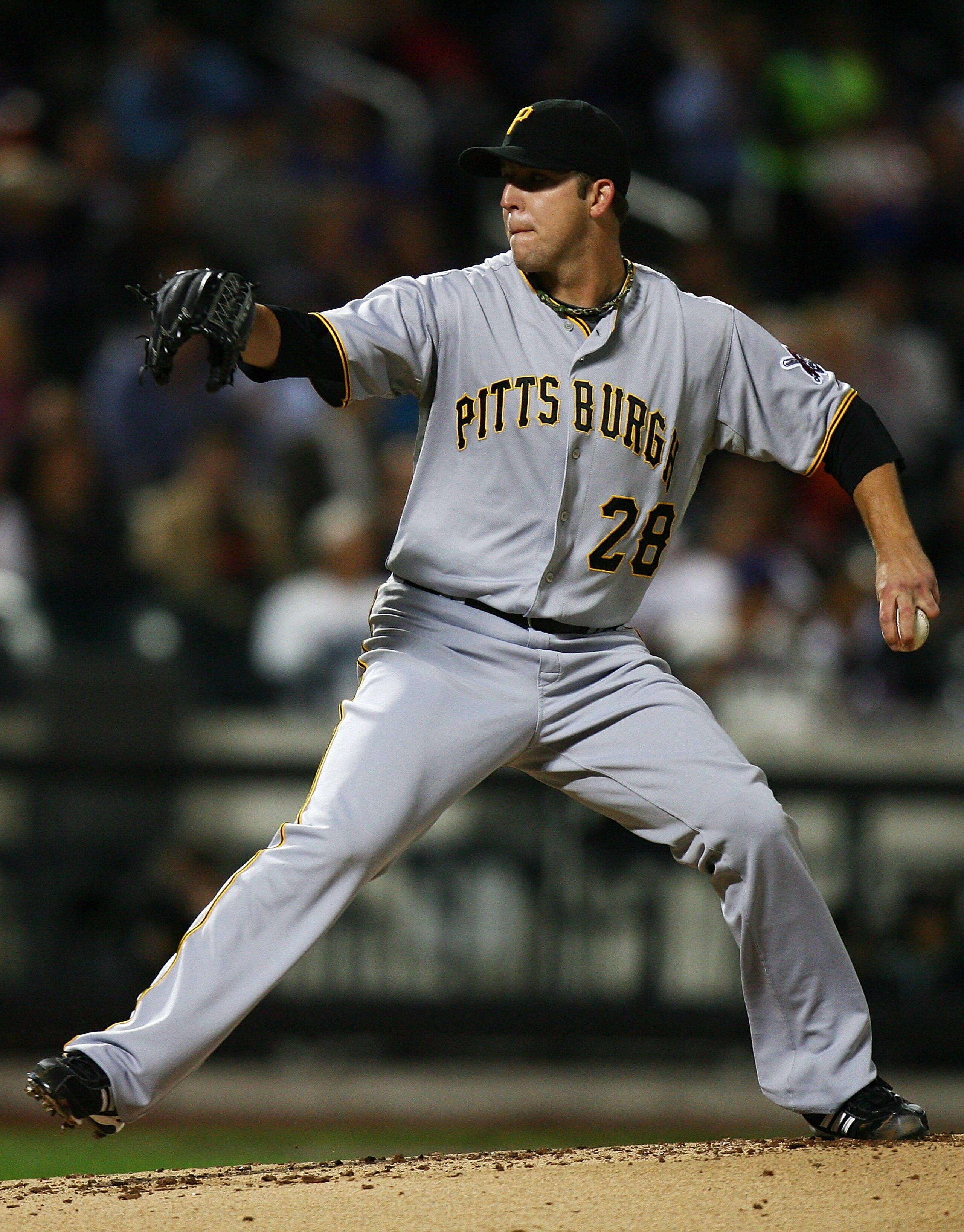 NEW YORK - SEPTEMBER 15:  Paul Maholm #28 of the Pittsburgh Pirates pitches against the New York Mets on September 15, 2010 at Citi Field in the Flushing neighborhood of the Queens borough of New York City.  (Photo by Andrew Burton/Getty Images)