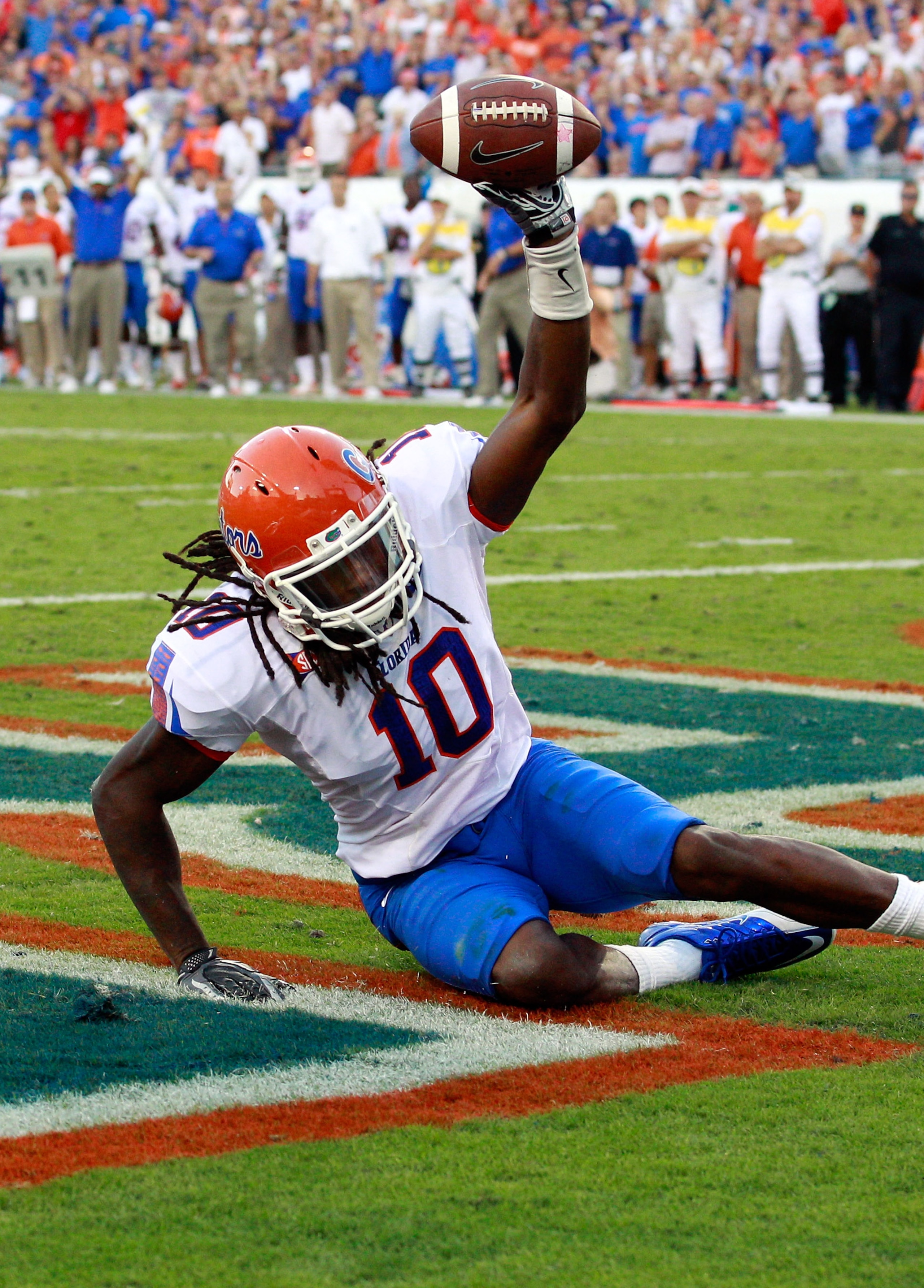 JACKSONVILLE, FL - OCTOBER 30:  Will Hill #10 of the Florida Gators holds up the ball after an interception during the game against the Georgia Bulldogs at EverBank Field on October 30, 2010 in Jacksonville, Florida.  (Photo by Sam Greenwood/Getty Images)