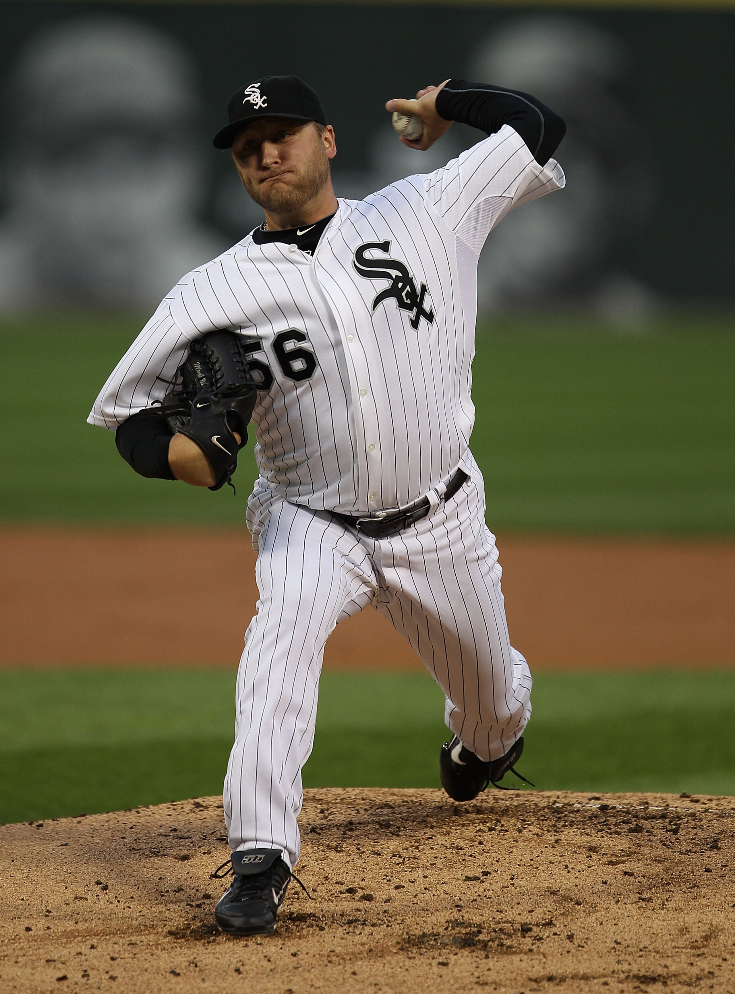 CHICAGO - AUGUST 25: Starting pitcher Mark Buehrle #56 of the Chicago White Sox delivers the ball against the Baltimore Orioles at U.S. Cellular Field on August 25, 2010 in Chicago, Illinois. The Orioles defeated the White Sox 4-2. (Photo by Jonathan Dani