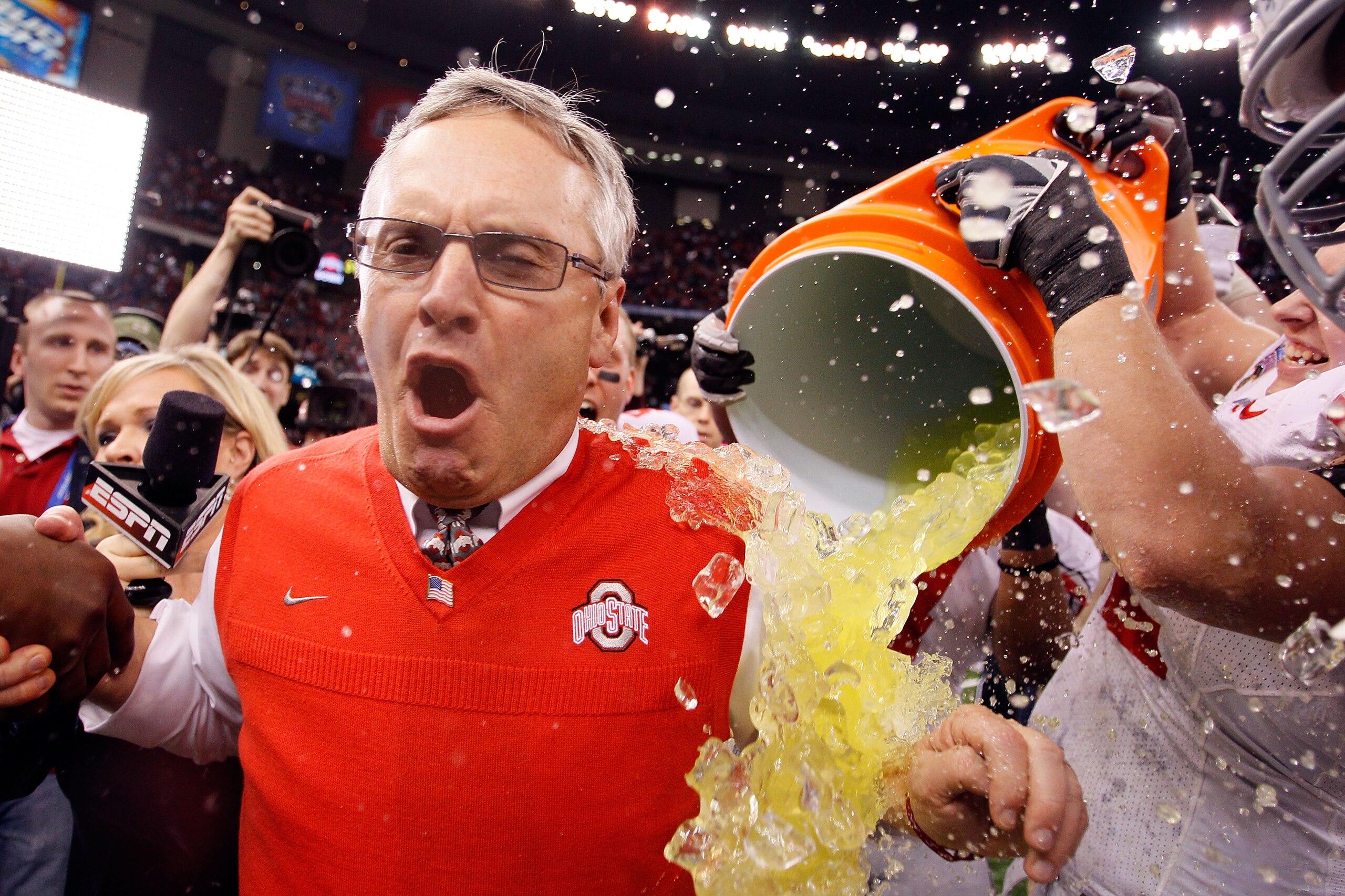 NEW ORLEANS, LA - JANUARY 04:  Head coach Jim Tressel of the Ohio State Buckeyes screams as Gatorade is dumped on him after the Buckeyes 31-26 victory against the Arkansas Razorbacks during the Allstate Sugar Bowl at the Louisiana Superdome on January 4,