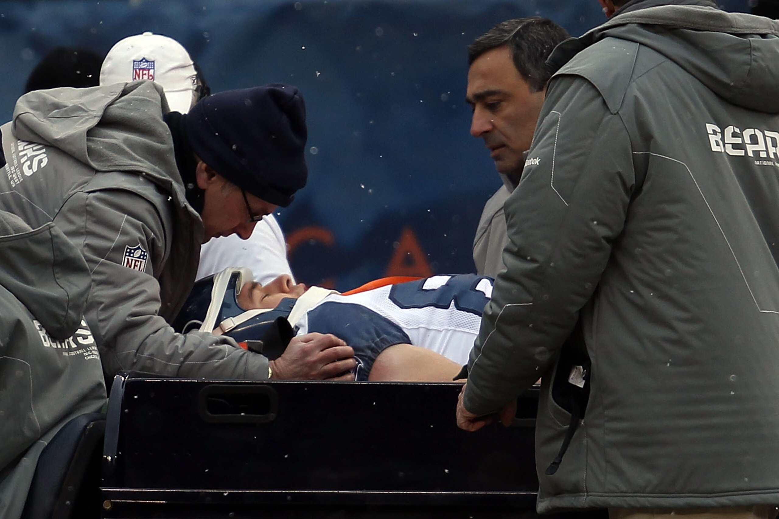CHICAGO, IL - JANUARY 16:  Tight end John Carlson #89 of the Seattle Seahawks is carted off the field after an apparent head injury in the first quarter against the Chicago Bears in the 2011 NFC divisional playoff game at Soldier Field on January 16, 2011