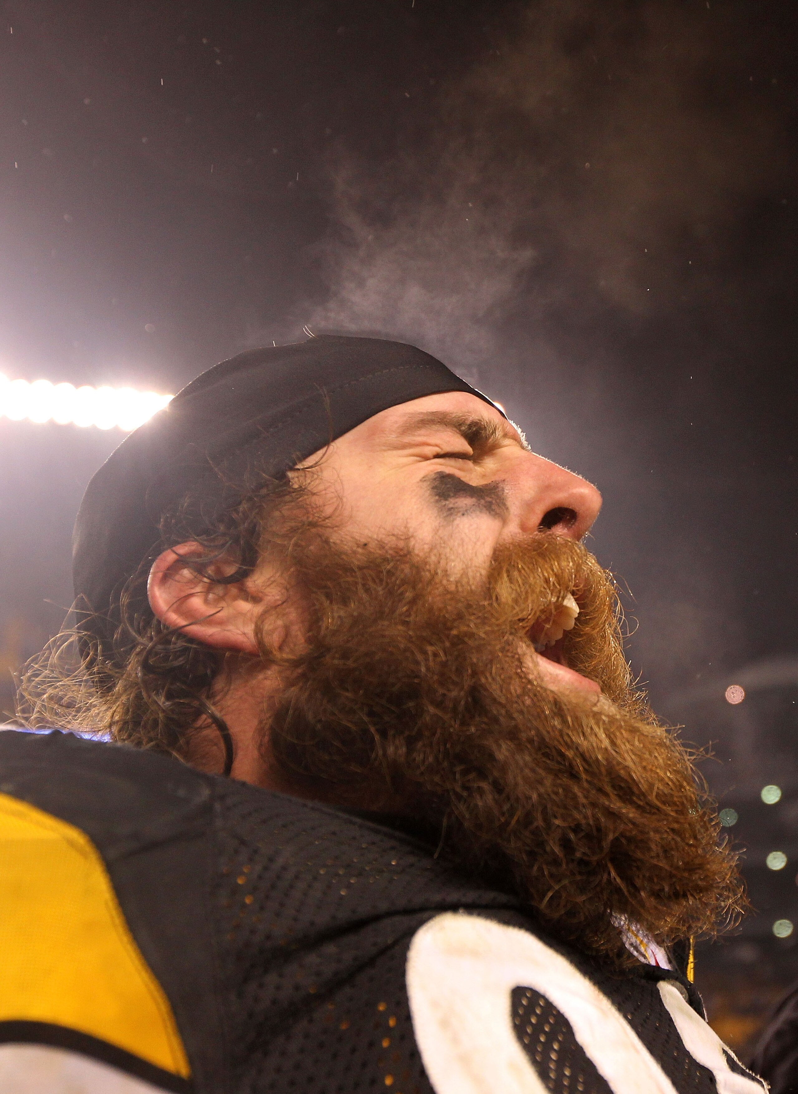 PITTSBURGH, PA - JANUARY 15:  Defensive end Brett Keisel #99 of the Pittsburgh Steelers celebrates after defeating the Baltimore Ravens 31-24 in the AFC Divisional Playoff Game at Heinz Field on January 15, 2011 in Pittsburgh, Pennsylvania.  (Photo by Nic