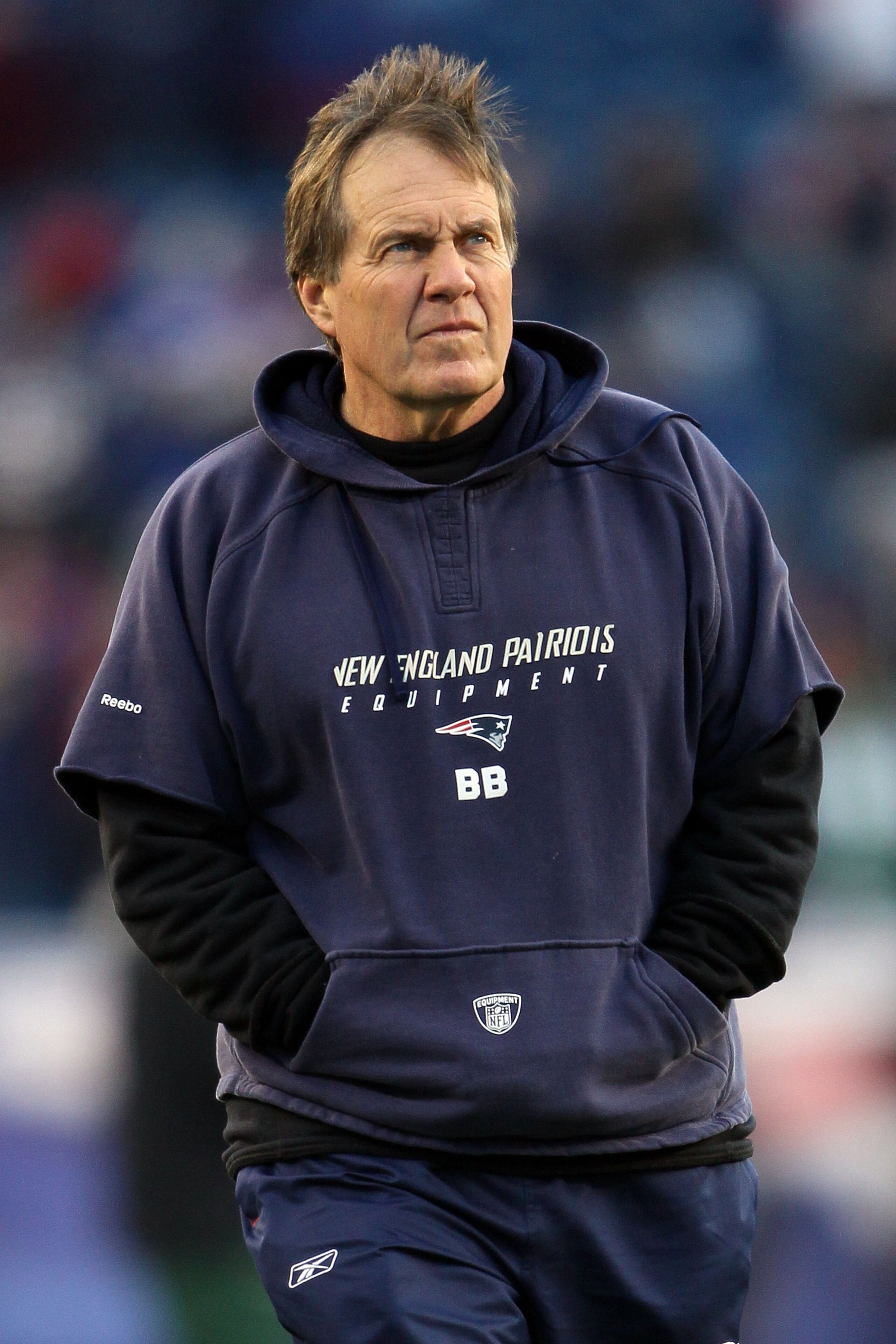 FOXBORO, MA - JANUARY 16:  Head coach Bill Belichick of the New England Patriots looks on during their 2011 AFC divisional playoff game against the New York Jets at Gillette Stadium on January 16, 2011 in Foxboro, Massachusetts.  (Photo by Elsa/Getty Imag