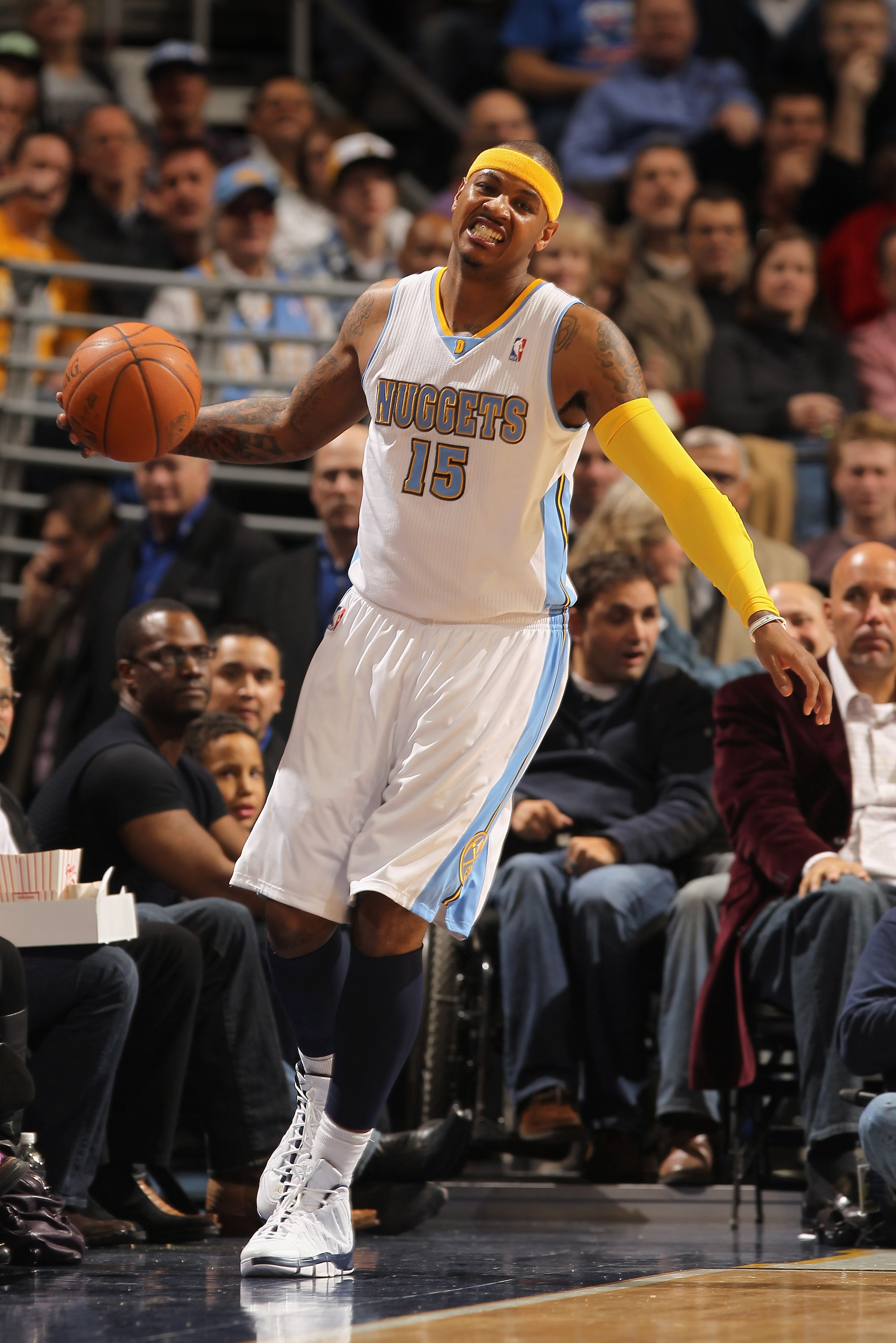 DENVER, CO - JANUARY 13: Carmelo Anthony #15 of the Denver Nuggets reacts as the ball goes out of bounds against the Miami Heat at the Pepsi Center on January 13, 2011 in Denver, Colorado. The Nuggets defeated the Heat 130-102. NOTE TO USER: User express DENVER, CO - JANUARY 13: Carmelo Anthony #15 of the Denver Nuggets reacts as the ball goes out of bounds against the Miami Heat at the Pepsi Center on January 13, 2011 in Denver, Colorado. The Nuggets defeated the Heat 130-102. NOTE TO USER: User express