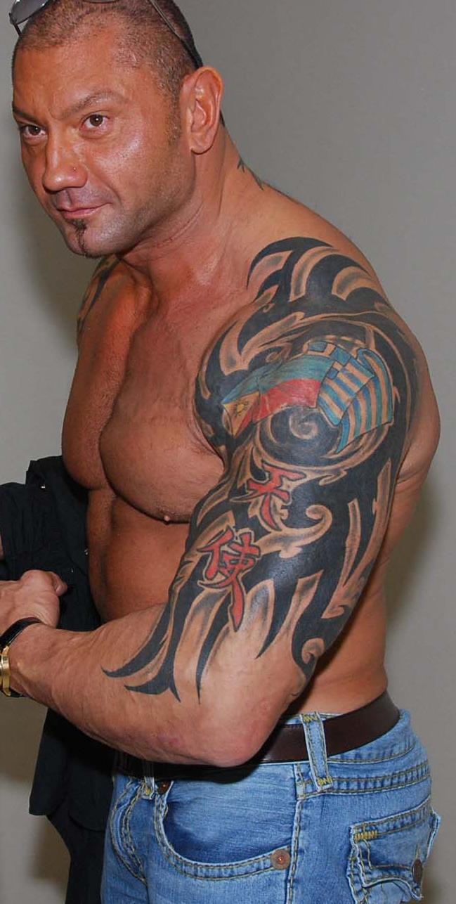 Watch Dave Bautista Breaks Down His Tattoos  Tattoo Tour  GQ