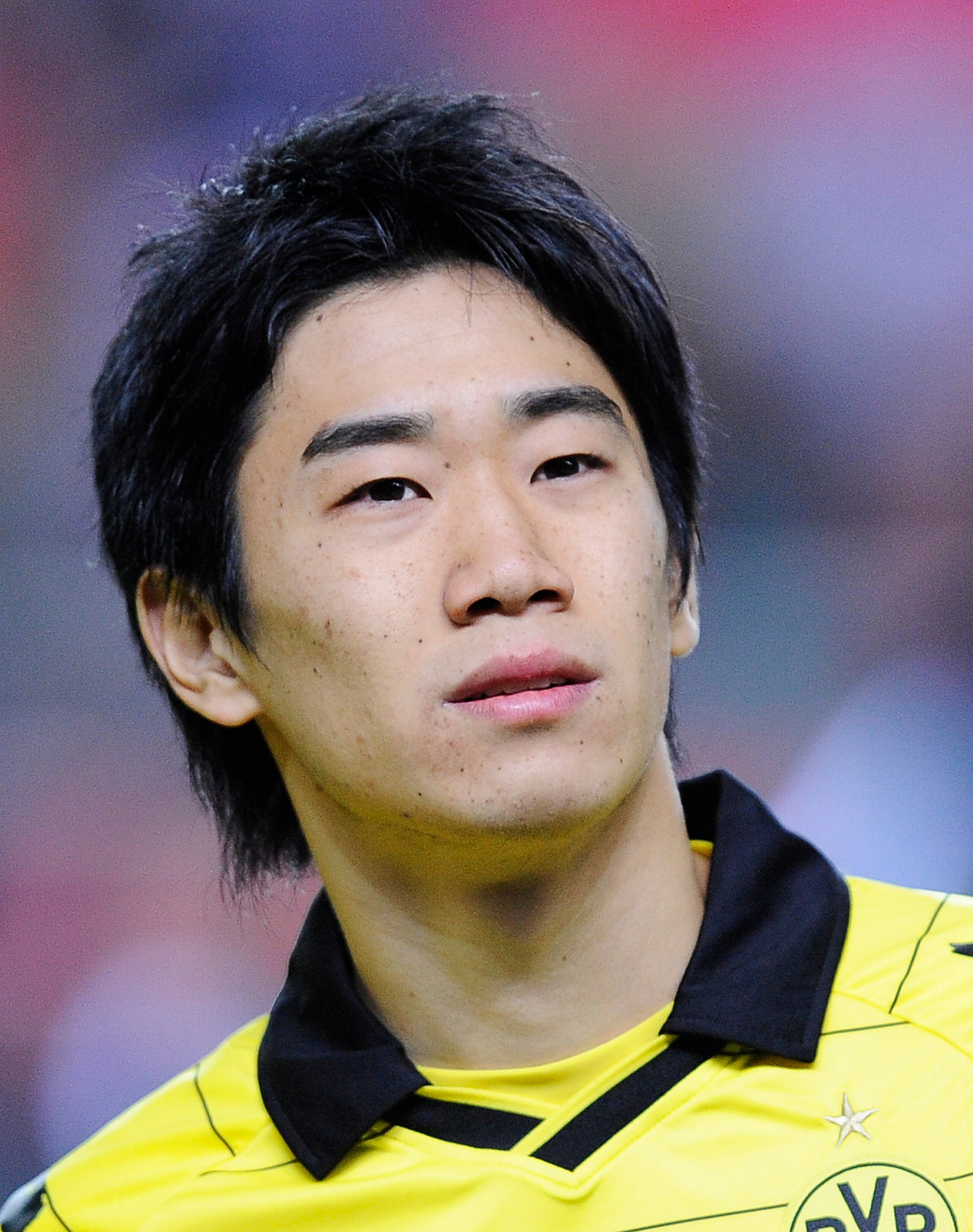 SEVILLE, SPAIN - DECEMBER 15: Shinji Kagawa of Borussia Dortmund looks on prior the UEFA Europa League group J match between Sevilla and Borussia Dortmund at Estadio Ramon Sanchez Pizjuan on December 15, 2010 in Seville, Spain. The match ended 2-2. (Pho SEVILLE, SPAIN - DECEMBER 15: Shinji Kagawa of Borussia Dortmund looks on prior the UEFA Europa League group J match between Sevilla and Borussia Dortmund at Estadio Ramon Sanchez Pizjuan on December 15, 2010 in Seville, Spain. The match ended 2-2. (Pho
