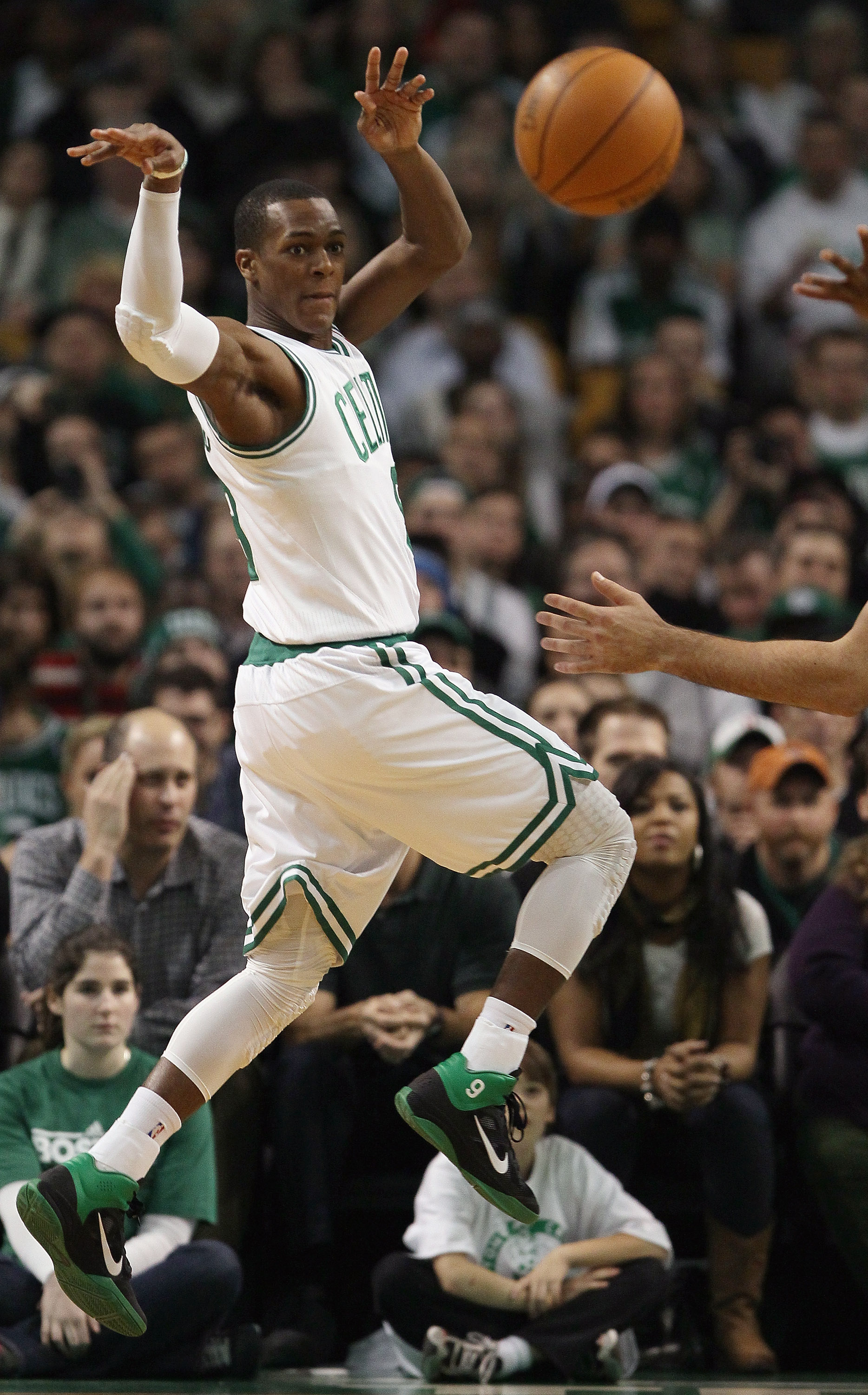 BOSTON, MA - JANUARY 10:  Rajon Rondo #9 of the Boston Celtics passes the ball in the second half against the Houston Rockets on January 10, 2011 at the TD Garden in Boston, Massachusetts.  The Rockets defeated the Celtics 108-102. NOTE TO USER: User expr
