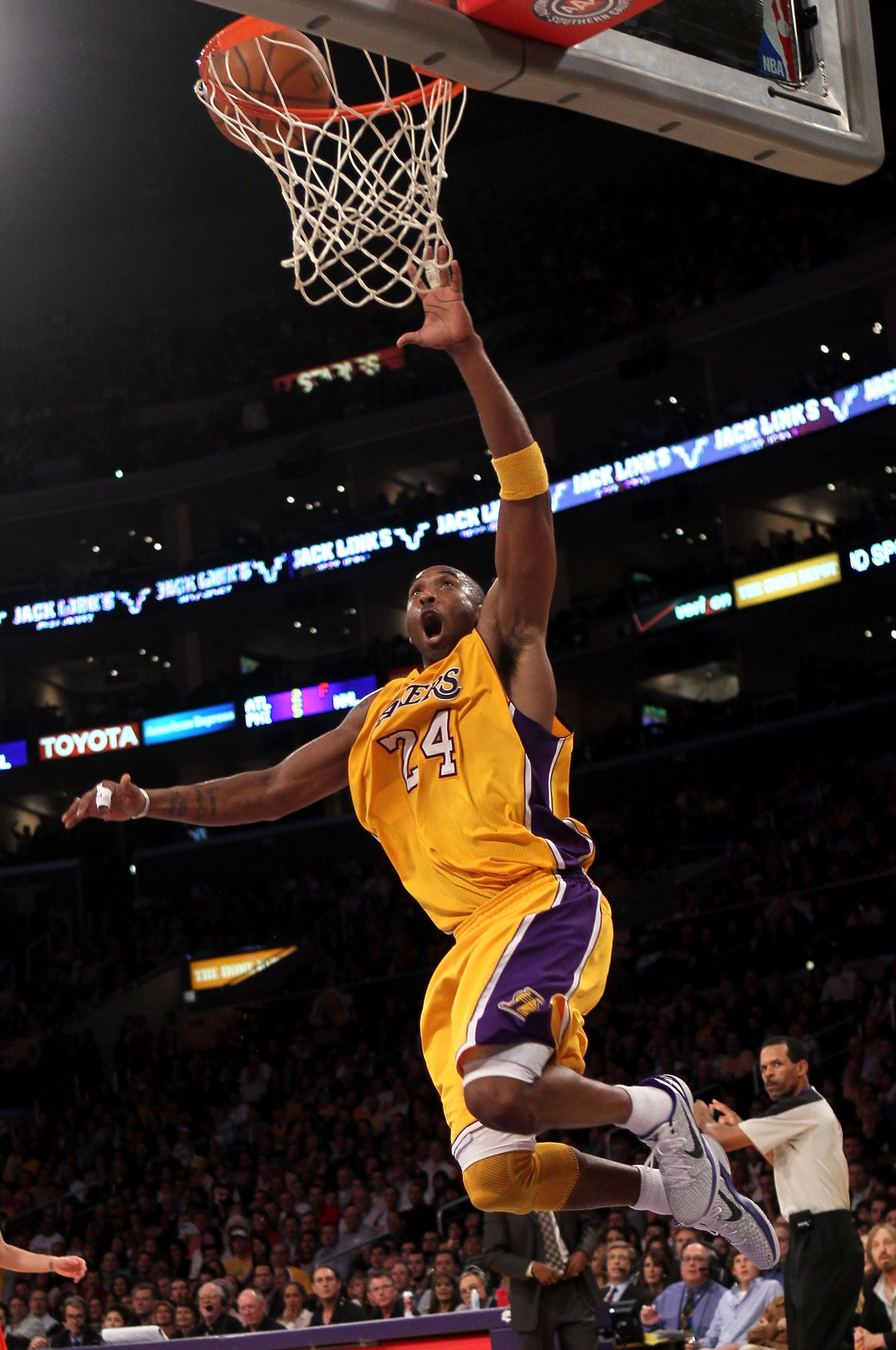 LOS ANGELES, CA - JANUARY 14:  Kobe Bryant #24 of the Los Angeles Lakers goes up after a passl against the New Jersey Nets at Staples Center on January 14, 2011 in Los Angeles, California. The Lakers won 100-88.  NOTE TO USER: User expressly acknowledges