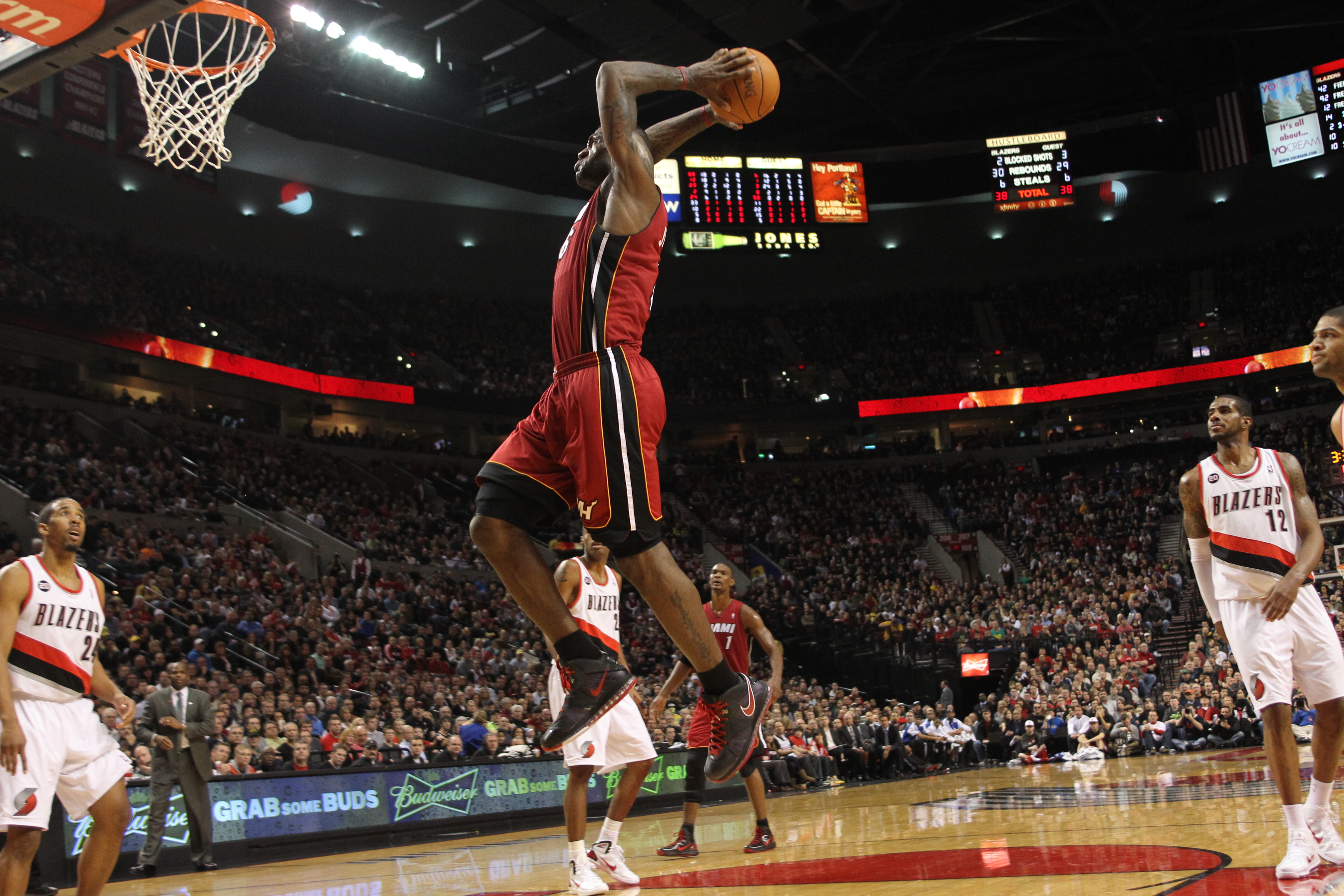 PORTLAND, OR - JANUARY 09: LeBron James #6 of the Miami Heat dunks against the Portland Trail Blazers during a game on January 9, 2011 at the Rose Garden Arena in Portland, Oregon. NOTE TO USER: User expressly acknowledges and agrees that, by downloading