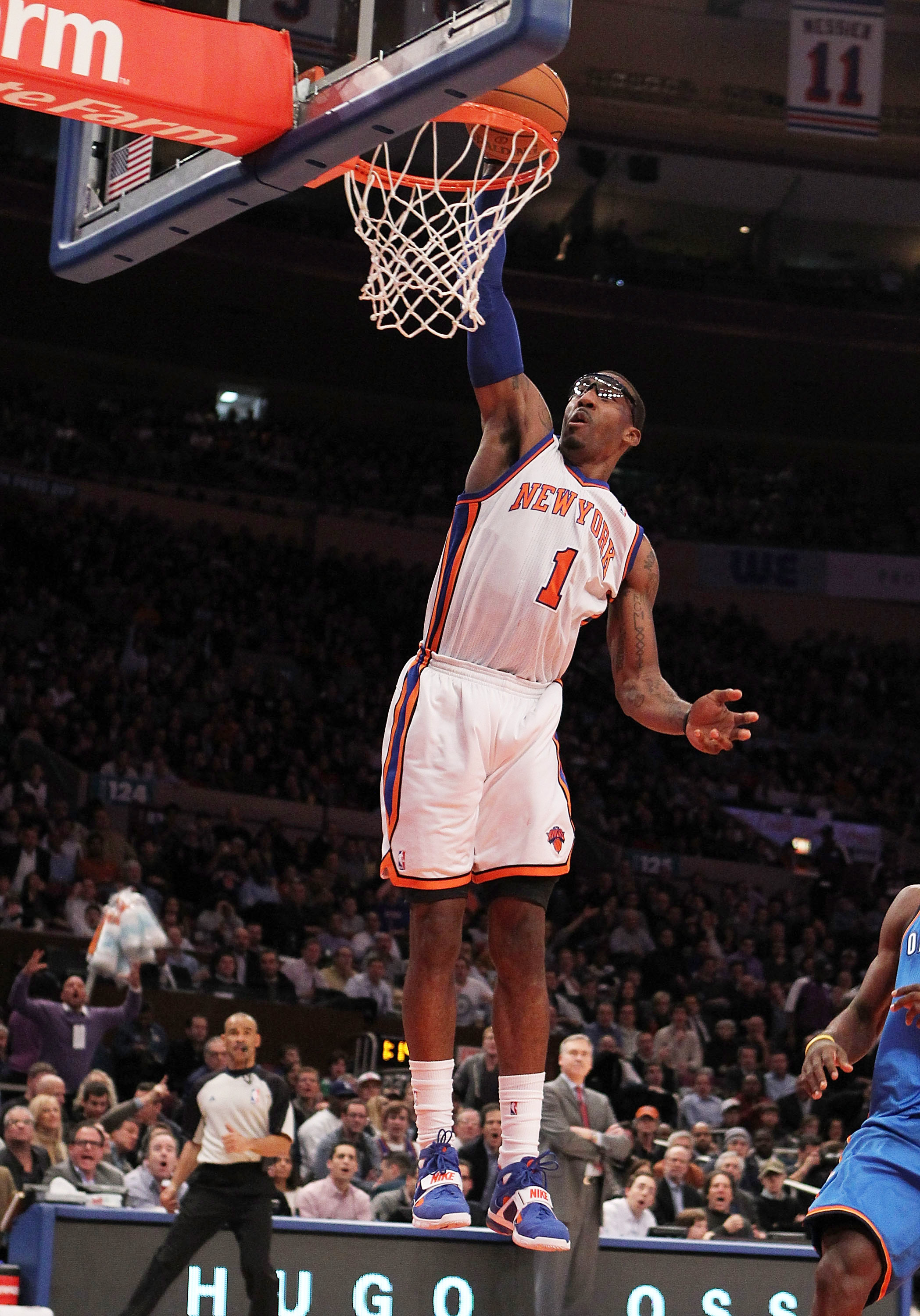 NEW YORK, NY - DECEMBER 22:  Amar'e Stoudemire #1 of the New York Knicks dunks the ball against  the Oklahoma City Thunder at Madison Square Garden on December 22, 2010 in New York City.   NOTE TO USER: User expressly acknowledges and agrees that, by down