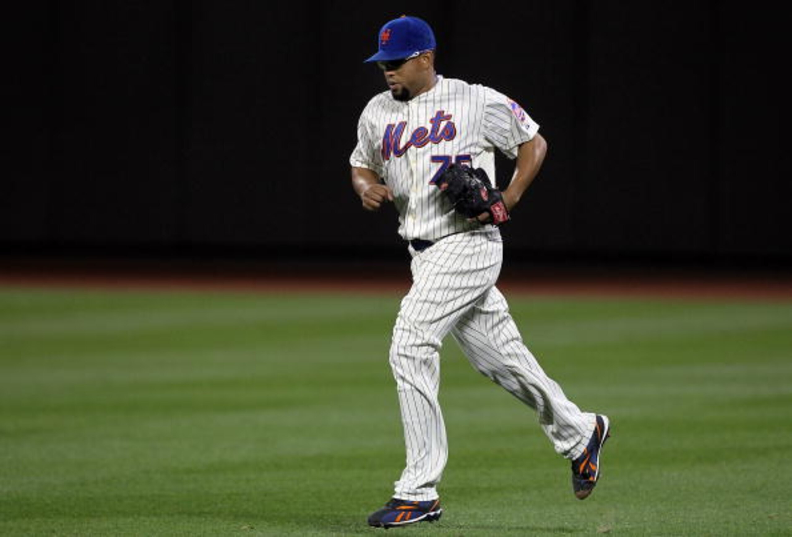 NEW YORK - AUGUST 14:  Francisco Rodriguez #75 of the New York Mets enters the game in the ninth inning against the Philadelphia Phillies on August 14, 2010 at Citi Field in the Flushing neighborhood of the Queens borough of New York City. The Phillies de