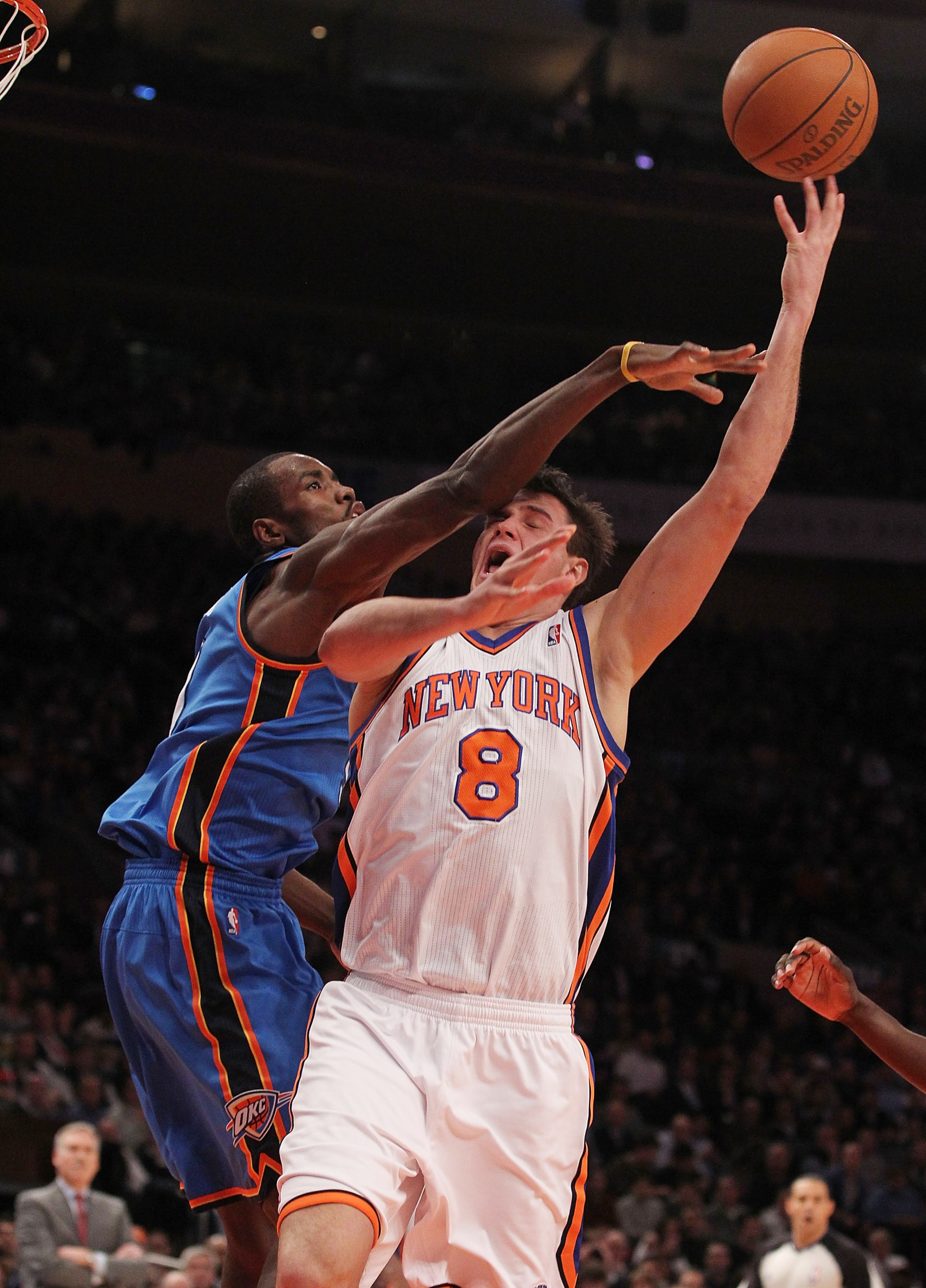 NEW YORK, NY - DECEMBER 22: Danilo Gallinari #8 of the New York Knicks is fouled by Serge Ibaka #9 of the Oklahoma City Thunder at Madison Square Garden on December 22, 2010 in New York City. NOTE TO USER: User expressly acknowledges and agrees that, by NEW YORK, NY - DECEMBER 22: Danilo Gallinari #8 of the New York Knicks is fouled by Serge Ibaka #9 of the Oklahoma City Thunder at Madison Square Garden on December 22, 2010 in New York City. NOTE TO USER: User expressly acknowledges and agrees that, by
