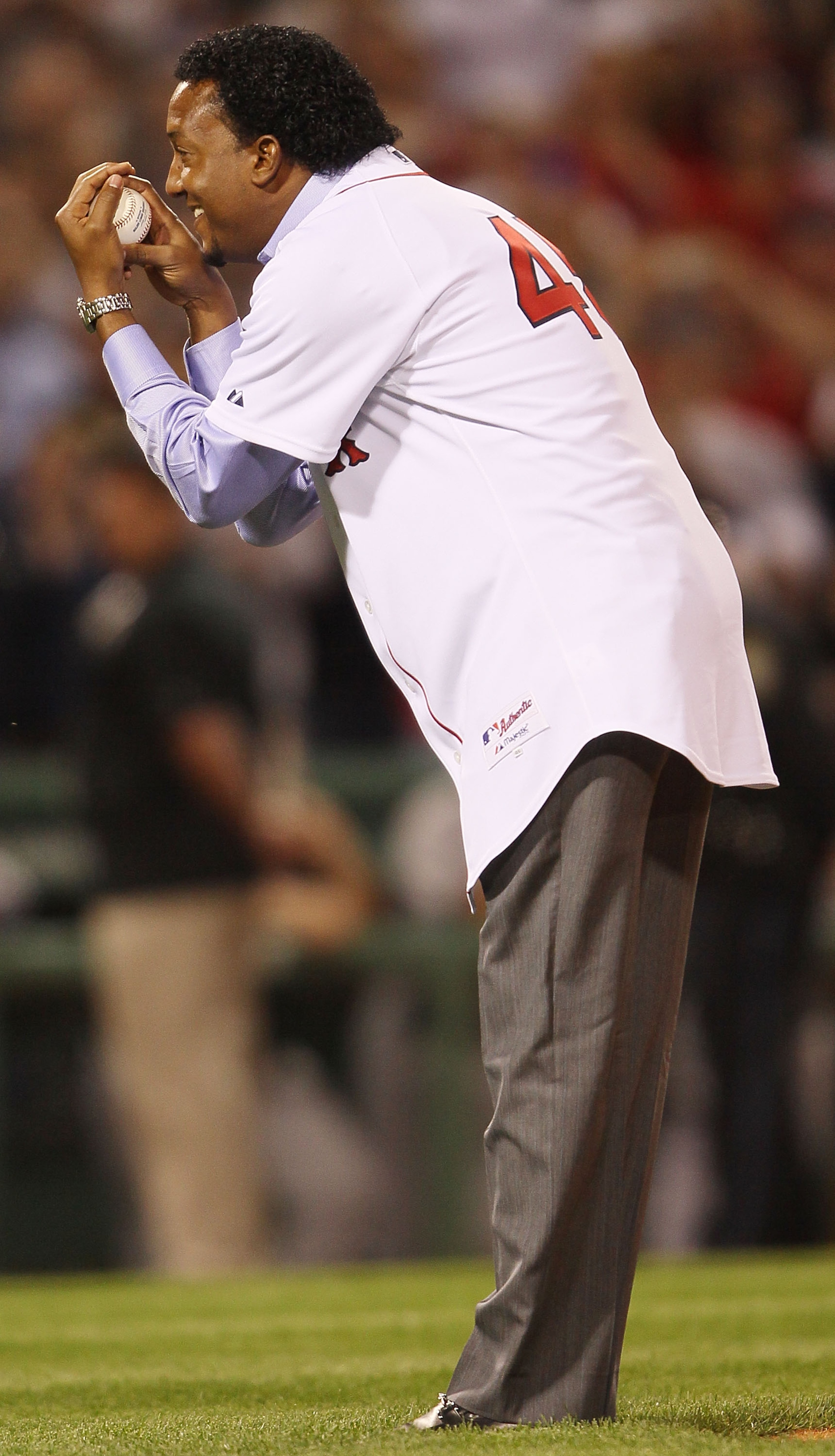 BOSTON - APRIL 04:  Former Boston Red Sox pitcher Pedro Martinez throws out the ceremonial first pitch before the game againt the New York Yankees on April 4, 2010 during Opening Night at Fenway Park in Boston, Massachusetts.  (Photo by Elsa/Getty Images)